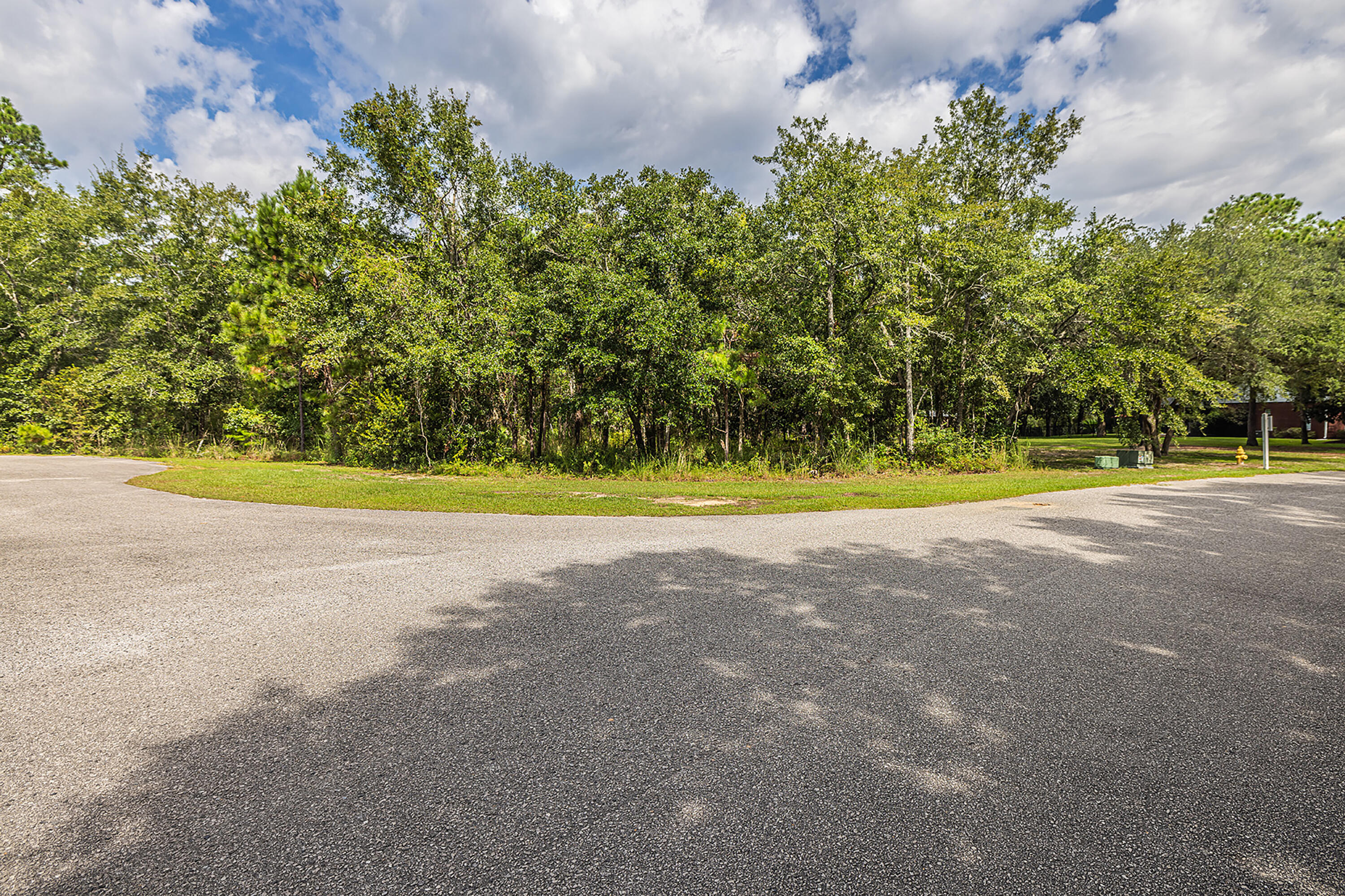 Build your dream home on this exceptional vacant lot of 1.22 ACRES in secluded Bay Harbour community of Freeport, Florida! Tucked away on a quiet cul-de-sac, this property is truly ready to go--saving you time and expense with key due diligence already completed, including a boundary survey, wetland delineation study, and topographical survey. Enjoy a peaceful waterview setting and the natural beauty that surrounds you, all while being just a short stroll from community amenities like tennis courts and a scenic boardwalk leading to Choctawhatchee Bay. Whether you're planning a full-time residence or a serene coastal retreat, this homesite offers the perfect blend of privacy, convenience, and charm. Don't miss your chance to create your own slice of paradise--your sunset views are waiting!