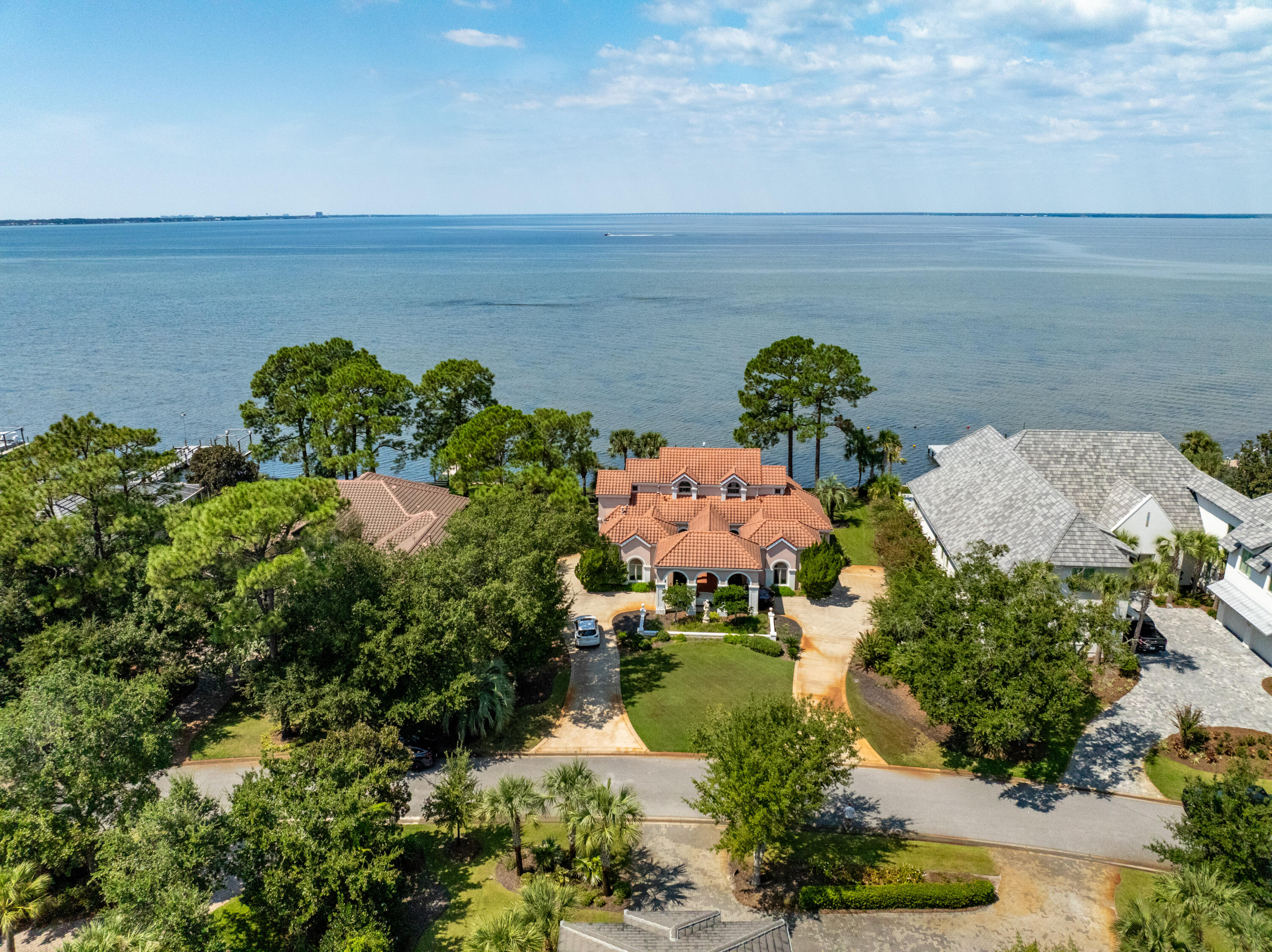 This 0.44 Acre parcel offers a generational opportunity at 3219 Bay Estates Circle--the premier, estate-sized homesite in the Burnt Pine community in Sandestin Golf and Beach Resort. 
The Vision: Design a new residence where floor-to-ceiling glass in the expansive living area and gourmet kitchen is your blueprint. Every square foot of your design will be dedicated to maximizing the sunset hues of the melting sun along the stunning Choctawhatchee Bay. Create a seamless, tranquil environment ideal for grand entertaining and peaceful personal enjoyment. A rare opportunity to build without compromise. Survey Available. boating, paddle boarding, or sunset cruises. There is ample room to add a custom pool in the bay front yard, making this home an entertainer's dream. A stately porte-cochere leads to two separate garages, offering convenience and architectural distinction. This is a truly one-of-a-kind property in one of the Emerald Coast's most desired neighborhoods ideal for the discerning buyer seeking location, space, and unlimited potential.
NOTE: photoshop used on some photos to demonstrate vacant rooms. Virtual tour is AI GENERATED, removing all contents.
As an introduction to the Sandestin lifestyle, we invite our new owners to explore amenities that make Sandestin special. The listing brokerage and seller(s) are presenting the buyer(s) of this property with (2) 90-minute rounds of Tennis court time, a golf foursome at one of our three championship courses, and a round of golf for up to four (4) players at the unrivaled Burnt Pine Golf Club.
Sandestin Golf and Beach Resort features more than seven miles of beaches and pristine bay front, four championship golf courses, 15 world-class tennis courts, a 226-slip marina, a fitness center, spa and celebrity chef dining. Shop, dine and play at the charming pedestrian village, The Village of Baytowne Wharf and more. Inside the gates of the resort, residents enjoy a balanced lifestyle of high-class living, spanning the 2,400 acres from the beach to the bay. Everything within the gates of the resort is accessible by golf cart or bicycle. The entire resort is interconnected by miles of pedestrian, bike and golf cart paths that weave through groves of live oaks, meandering past natural lagoons, fountains, man-made lakes, and meticulously landscaped fairways.