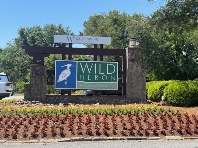 Awesome lot where no one can build in front or behind you. From a 2nd story you could have a lake view. The gated community of Wild Heron which features the Greg Norman  designed Sharks Tooth golf course and country club, scenic nature walks, fitness center with bathhouse, boathouse, lake view community pool, fire pit, and playground. It is a community that provides areas for fishing, kayaking, canoeing, and boating. Located close to the beach, 30A, and the ECP airport. Call your favorite Realtor to see this lot today. No entry without a Realtor.
