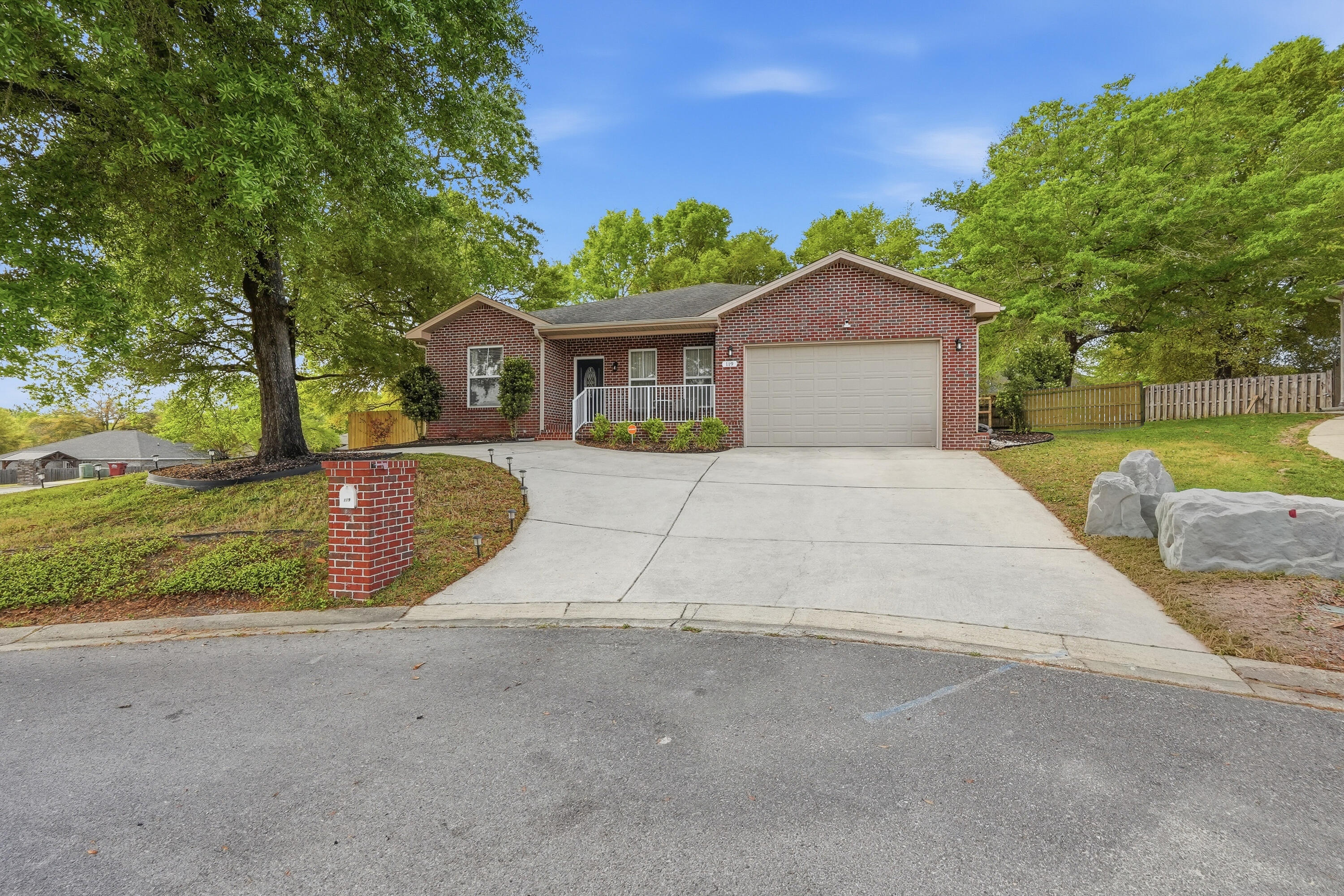 Seller to pay $5,000 in closing costs with acceptable offer.  Beautiful all-brick 4BR/2BA home in Trailwood Estates, situated on a large corner lot just off a quiet cul-de-sac. This split floor plan offers 9' ceilings, a spacious living area, and formal dining. The kitchen features granite countertops, rich cabinetry, and stainless steel appliances--ideal for everyday living and entertaining. The private primary suite includes a walk-in closet and well-appointed bath. Enjoy a fenced backyard with open patio space for outdoor living. Paid-for solar panels provide energy efficiency and long-term savings. Convenient to schools, shopping, Duke Field and 7th Special Forces Group.