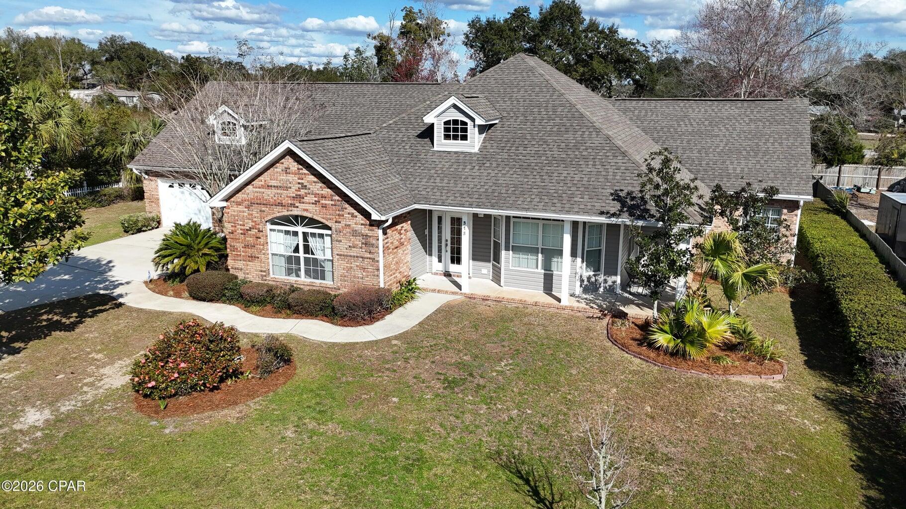 Spacious 3-bedroom, 2-bath traditional ranch-style brick home offering approximately 3,006 sq. ft. of living space in the heart of Callaway. This well-designed home features a split floor plan with generous living areas and thoughtful details throughout. An additional room just off the garage provides flexibility and could easily serve as a 4th bedroom, home office, or bonus space to fit your needs. As you enter through the grand front entrance, you are welcomed by a formal dining room, perfect for hosting gatherings and special occasions. The kitchen is truly built for entertaining, offering ample counter space and a layout that flows seamlessly into the living areas. Just off the kitchen, you will find a breakfast area complete with built-in china and wine storage, giving you both convenience and charm. This home offers the best of both worlds with a full breakfast area as well as a separate formal dining space. The primary suite is truly impressive, featuring a large master bedroom, a huge master bath, and a spacious walk-in closet located just off the bathroom. The split floor plan provides privacy for the additional bedrooms and guest areas. Additional features include a good-sized laundry room and an oversized garage with two main bays plus a third rear-access bay perfect for a golf cart or additional storage. This classic Southern ranch-style brick home welcomes you with a wrap-around front porch, perfect for relaxing and enjoying the neighborhood. Step out back to the back porch, a great spot for winding down and enjoying quiet Florida evenings. The location is exceptional--just one street over from waterfront property and close to family-friendly parks, including Gore Park right around the corner. Located in the heart of Callaway and just minutes from Tyndall Air Force Base, the area has grown tremendously and now offers a variety of shops, restaurants, and everyday conveniences just around the corner. This home offers space, charm, and an incredible location all in one.