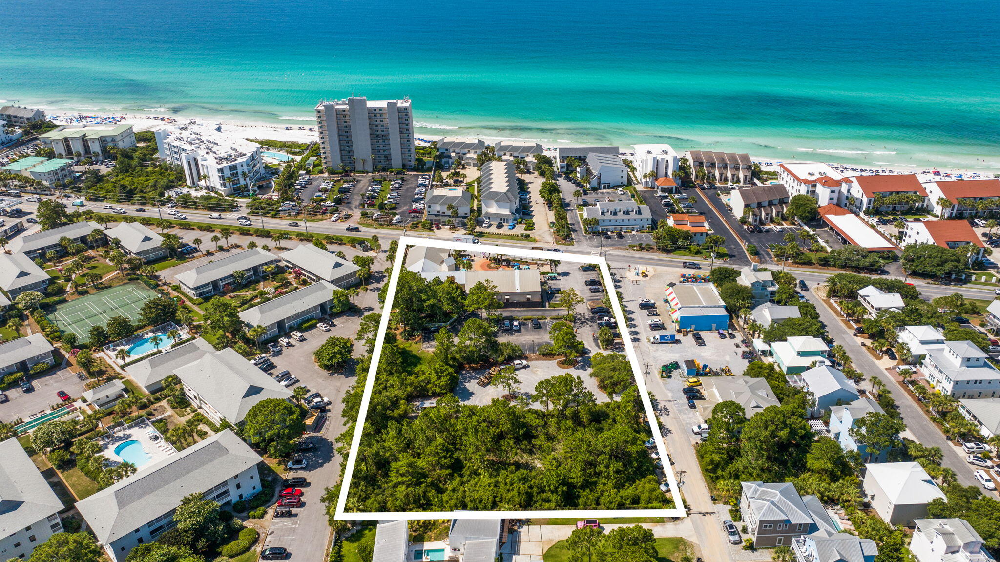Premier 30A Mixed-Use Redevelopment Opportunity Existing Plaza and Vacant Land (VMU) directly across from the Gulf. 

An exceptional opportunity to acquire one of the few remaining redevelopment sites in the heart of Seagrove Beach along Scenic Highway 30A.

Situated on an approximately 2.35 +/- acre corner parcel with 254 ft of direct Scenic Highway 30A frontage and 470 ft along intersecting Campbell Street, the iconic Seagrove Plaza occupies a highly visible location surrounded by luxury condominiums, vacation rentals, boutique retail, restaurants and public beach accesses to some of Florida's most sought after beaches. If 30A had a heart you'd find it strategically placed in Seagrove Beach, and if Seagrove had a heart you'd find it at SEAGROVE PLAZA!

The property is currently improved with a fully leased income producing commercial plaza that has created memories for tourists and locals since 1990, but the greater value lies in its future development potential. Zoned Village Mixed Use (VMU), the site offers flexibility for a broad range of commercial, residential, hospitality, office, retail, live/work, and mixed use concepts. Planning analysis indicates the zoning is particularly well suited for village style development featuring commercial uses at street level with residential components above. 

Located within the prestigious Scenic 30A Corridor, the property benefits from year round tourism, affluent demographics, and continued demand for thoughtfully designed mixed use projects. County development analysis further indicates the site is not impacted by wetlands or mapped flood prone areas and is supported by infrastructure, established access, and surrounding residential density.

Redevelopment opportunities of this size, zoning designation, and location have become increasingly scarce along 30A, creating a compelling opportunity for developers, investors, hospitality groups, and family offices seeking a strategic foothold within one of the Southeast's most desirable coastal markets. Plant the seed for your vision and capitalize on the future growth. Note, one partner holds active FL Real Estate License.