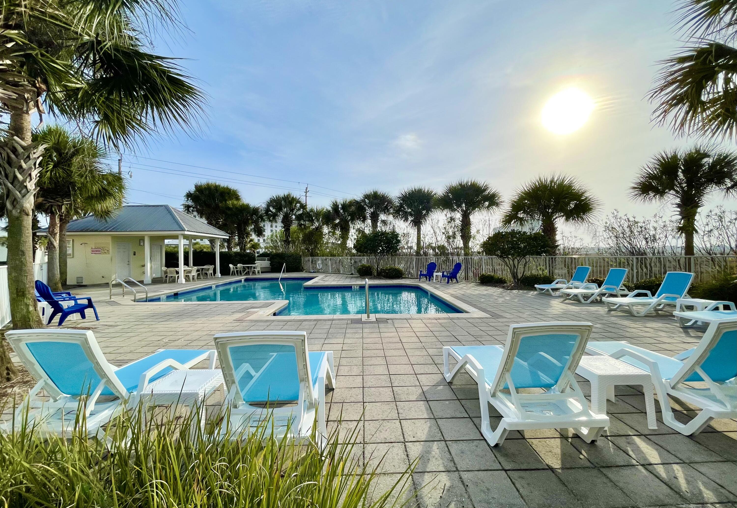 Tucked along the unspoiled shores of Navarre Beach, this charming 1-bedroom (+hall bunks), 2-bath coastal retreat at Gulf Islands offers the kind of laid-back beach life that's harder and harder to find. Sleeping up to 6, this adorable first-floor condo is decorated in a breezy coastal style and offers the rare ease of no-stairs living -- a true find in this sought-after complex.
Step outside and discover everything that makes Navarre Beach so special: stroll the iconic Navarre Beach Fishing Pier, take the public walkover to the shimmering Gulf of Mexico, and explore the locally loved dining and shops that give this community its charm. The rental history doesn't tell the whole story- a hands-off management style may have left income on the table. Projections vs. history available. The upside is yours to capture. Gulf Islands has invested over $1,000,000 in recent renovations -- all assessments have been paid, making it a worry-free opportunity whether you're looking for a personal getaway, vacation rental, or investment property.