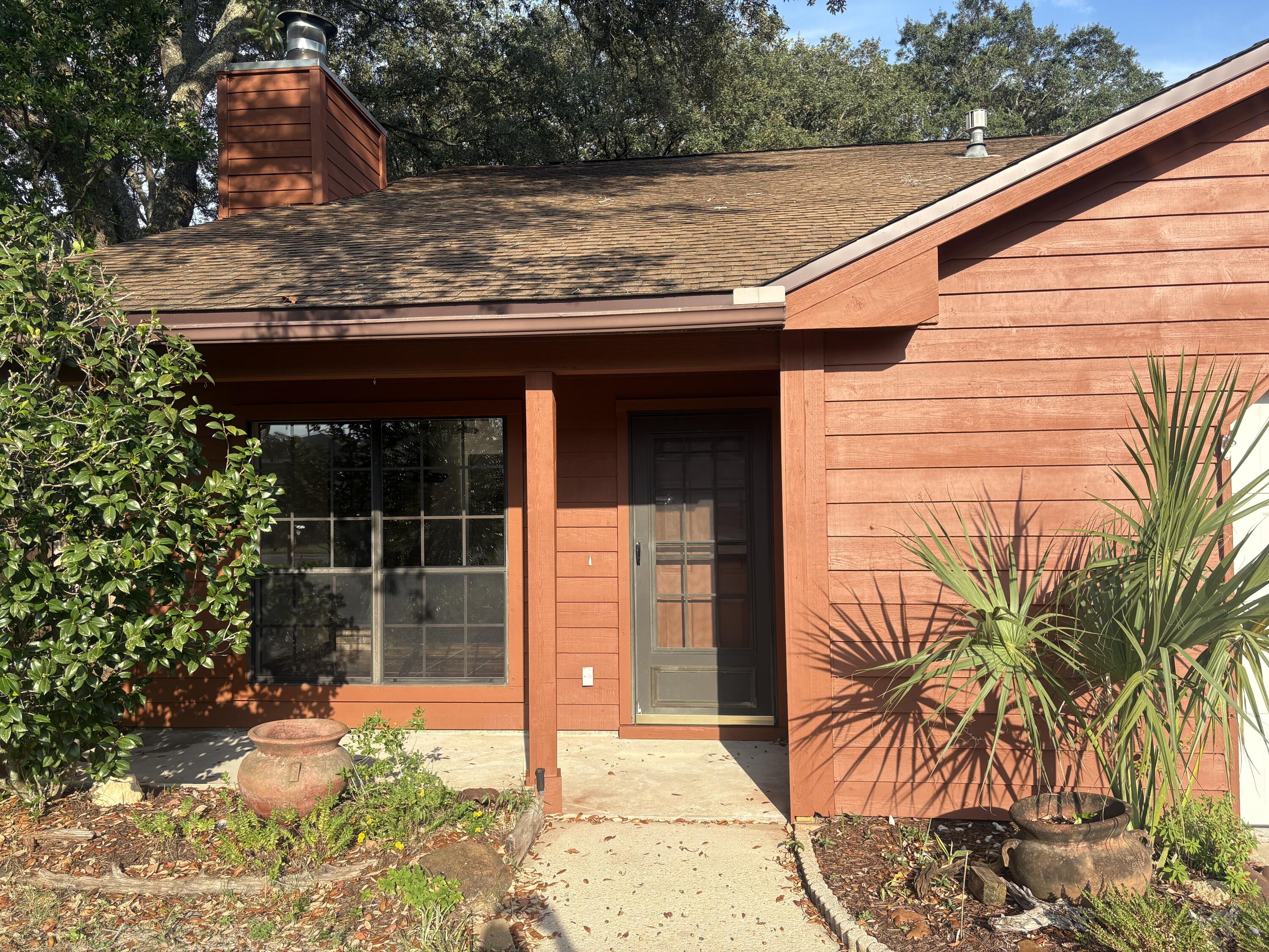Step inside this two-story home featuring soaring vaulted ceilings and a cozy wood-burning fireplace in the spacious living area. The open-concept kitchen with butcher block bar flows seamlessly for easy entertaining, and through the sliding glass doors to the screened-in back porch provides a relaxing spot to unwind.
Conveniently located directly across from Northwest Florida State College, with easy access to Destin and Fort Walton Beach, Eglin AFB, 7th Group, and EOD—all while avoiding central Niceville traffic.
This home offers 3 bedrooms, 2 bathrooms, and ample closet space. The fully fenced backyard is ideal for pets or play. Additional features includes *excellent attic insulation*natural gas outlet for an outdoor grill or heater, *wood-stained trim, *a whole-house attic fan for quick ventilation cool fall evenings.  Main bedroom has two closets, one has built in desk.
The home is largely in its original condition, providing buyers the opportunity to make updates and design choices to fit their personal preference.  Additional information: Electrical -Square D,QO electrical panel and all copper wiring; Plumbing: Gas Water Heater with all copper piping:HVAC original, but in good working order; Roof- "30 year" Architectural/Dimensional (2008) in good condition
This property is well-suited as a primary residence or investment opportunity. Buyer to verify all dimensions, features, and information deemed important.
Schedule your showing today!