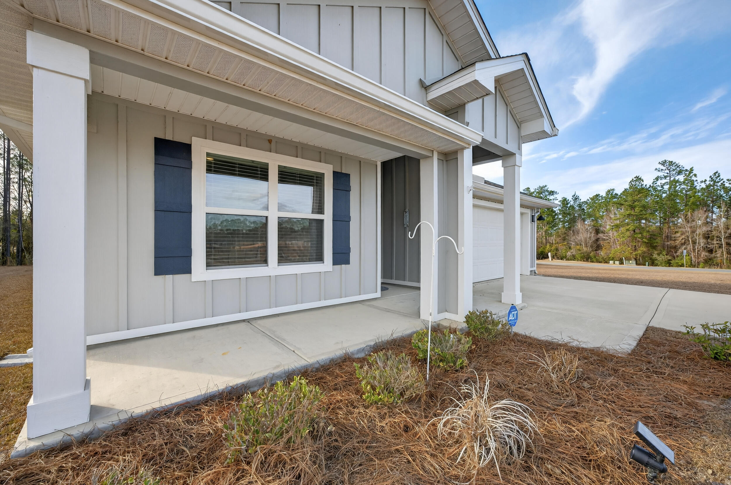 UP TO $15,000 Seller Credit!! Built in 2023 & used only as a second home, this one is truly like-new, this home has been meticulously maintained, the owner just added new gutters this year and this one has both front and back covered porches. Inside, the open, split-bedroom floor plan has a spacious living area, crisp white cabinetry, and a large kitchen island - perfect layout for entertaining or everyday living. Modern upgrades include a Smart Home Connect system, whole-home water softener, air purifier & a tankless gas water heater, delivering convenience, cleaner air and water, and endless hot water on demand. The primary suite offers a double vanity, low threshold shower, water closet, & large walk-in closet. A huge half-acre lot in Laurel Hill - just north of Crestview awaits!
