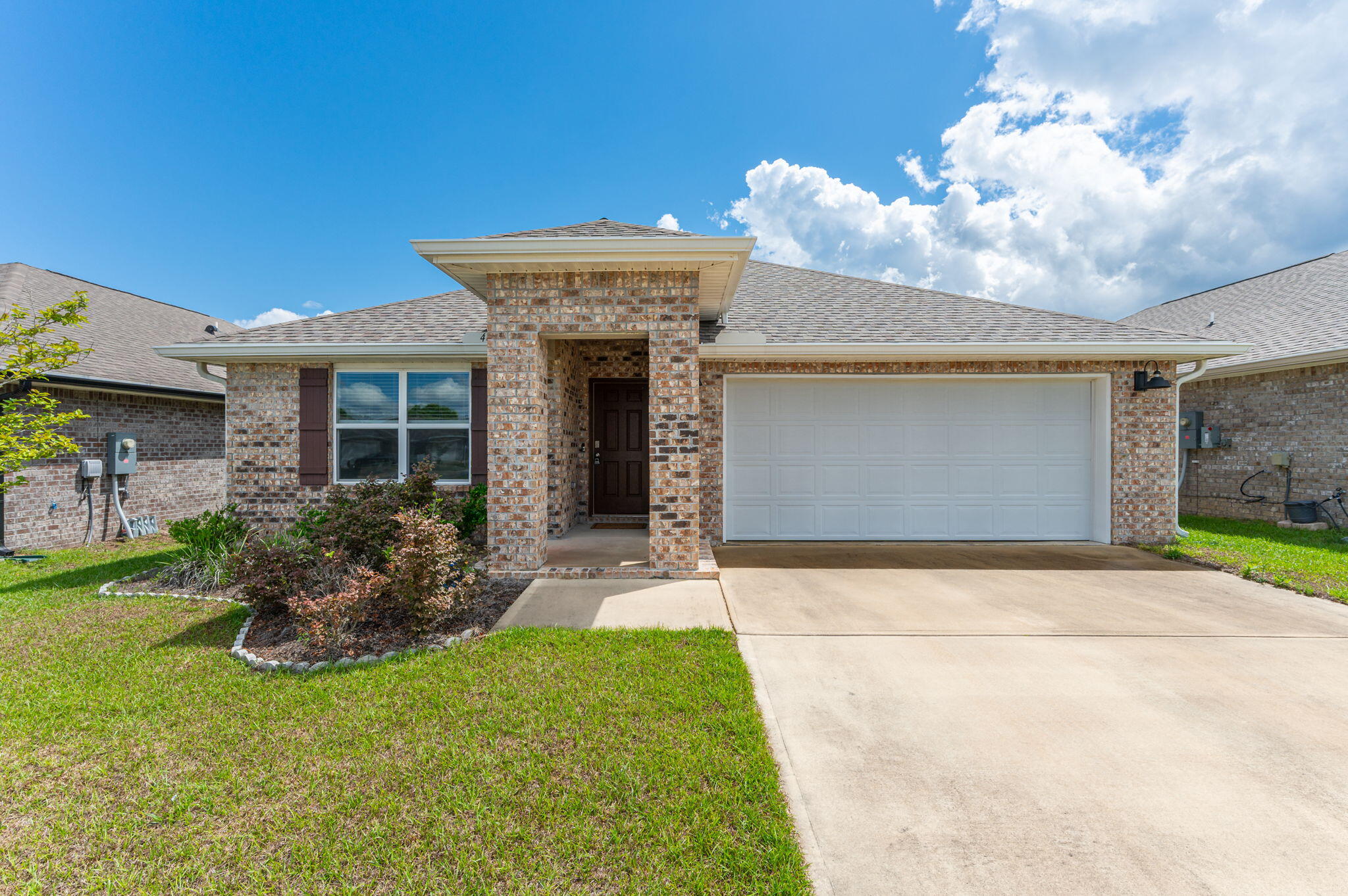 Welcome to this beautiful 4-bedroom, 2-bathroom home in the desirable Patriot Ridge community of Crestview! Offering a spacious open floor plan and modern finishes, this home is designed for comfortable living and easy entertaining.

The heart of the home is the well-appointed kitchen, featuring stainless steel appliances, granite countertops, and a gas stove. The open-concept design allows the kitchen, dining area, and living room to flow seamlessly together, creating a welcoming space for everyday living and gatherings.

The spacious primary suite offers a private retreat with a luxurious en-suite bathroom featuring dual vanities and a large walk-in closet for plenty of storage. Step outside to enjoy the fully fenced backyard, providing privacy and plenty of space for outdoor entertaining, pets, or relaxing in the Florida sunshine.

Located in the Patriot Ridge community, this home offers both comfort and convenience. Don't miss the opportunity to make this beautiful house your new home--schedule your showing today! Pets considered with application.