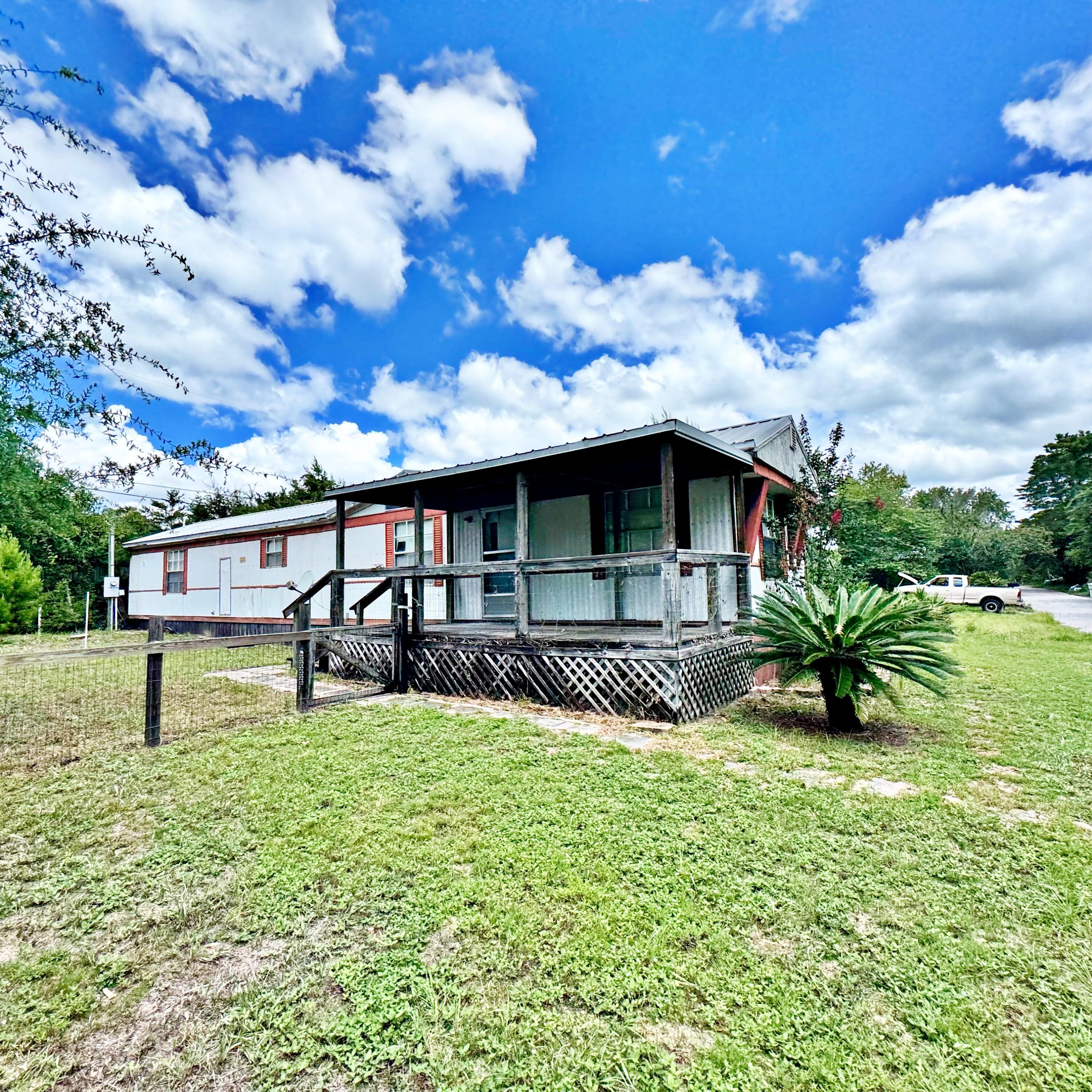 Investor, cash buyer, or renovation opportunity in Navarre! Located at 1969 Blankenship Rd, this mobile home offers potential for a buyer looking for an affordable property, rental opportunity, or project to improve and make their own. Property is being sold as-is, and buyer should complete all inspections and due diligence to verify condition, use, zoning, utilities, lot size, and financing eligibility. Conveniently located near Navarre, Gulf Breeze, Hurlburt Field, shopping, dining, and area beaches.