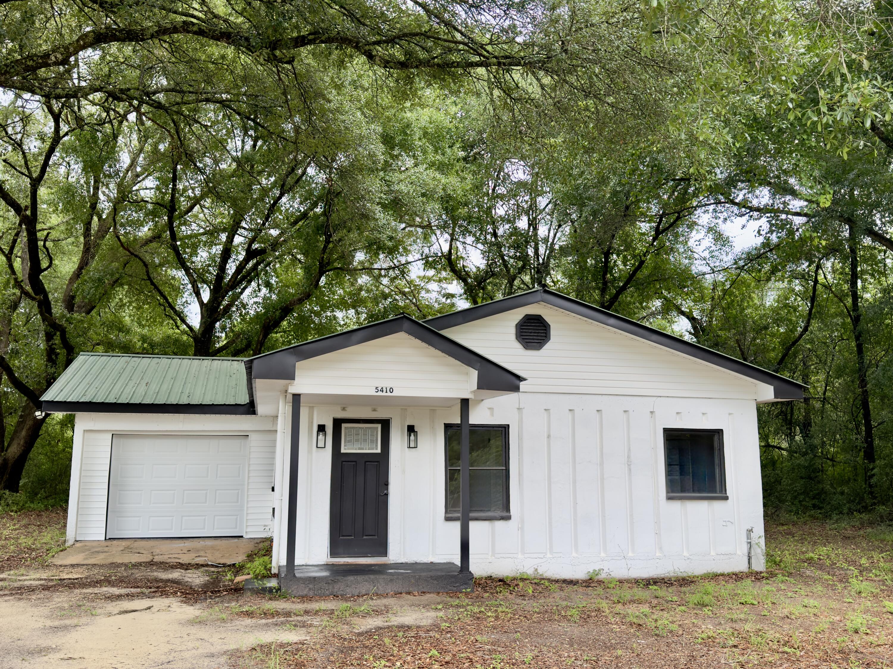 Welcome to 5410 Malcolm Tucker Rd, Crestview, FL 32536! This move-in-ready home offers a rare combination of durability and modern updates with solid concrete construction and extensive renovations completed in 2022. Major improvements include a new HVAC system, new kitchen appliances, updated lighting throughout, and a new electrical panel. A brand-new garage door was recently installed May 2026, adding to the home's appeal and functionality.
The solid concrete walls and ceilings provide exceptional strength, energy efficiency, and low-maintenance ownership. Inside, you'll find updated finishes and a functional layout ready for its next owner. Situated on a spacious lot, this property offers room to enjoy outdoor living while still being conveniently located near shopping, dining, schools, and all that Crestview has to offer.
