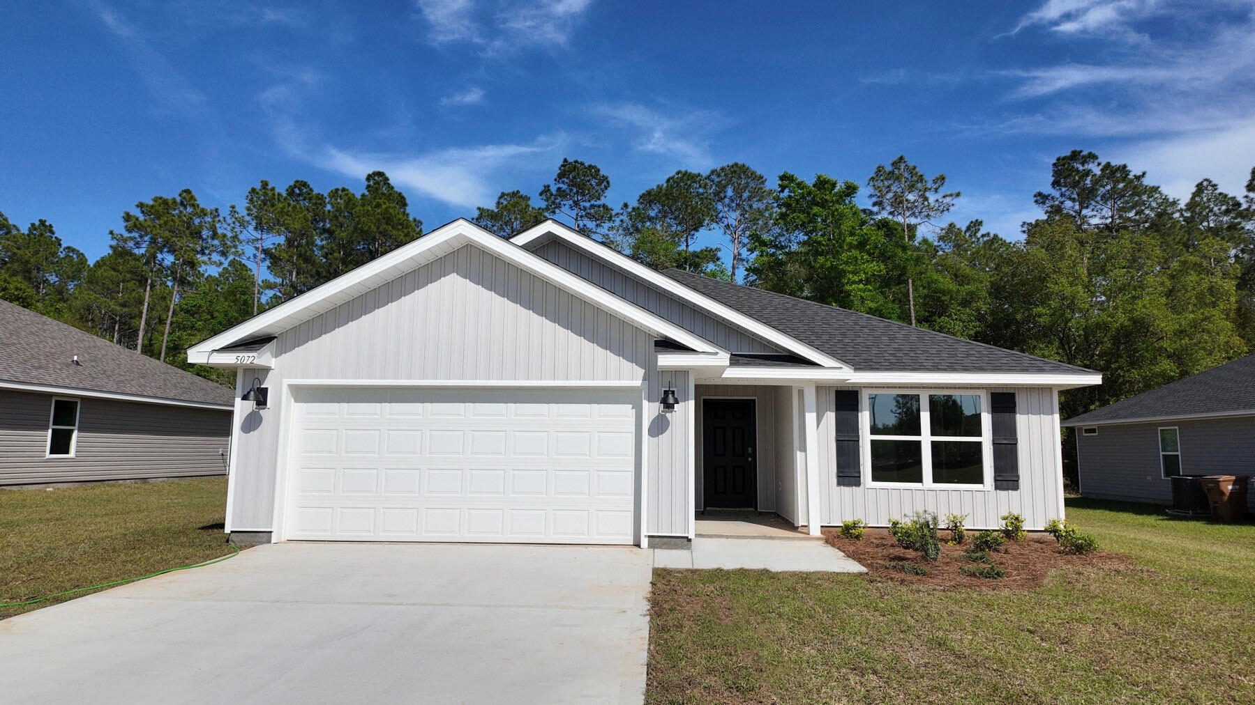 Welcome to the Lismore Plan, at Liberty Farms, our new home community in Milton, Florida! Just under 1,600 square feet, this beautiful single- story home offers 3-bedrooms with 2-bathrooms, a 2-car garage, and a seamless open layout with charming features. A 'Smart Home Connect' System with various convenient Smart Home devices. The well-appointed kitchen includes stainless steel appliances, a smooth-top range, built-in microwave, quiet dishwasher, corner pantry, island bar, eye-catching wood-look flooring, and plush carpet in the bedrooms. Laminate Countertops in the Kitchen & Baths. Fabric Hurricane window and door protection is also included. Enjoy the stylish curb appeal in this rapidly growing area with easy access to the interstate. ALL LISTING pictures, colors, features, and size may vary. Square footages are approximate.