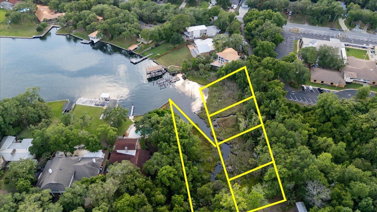 Rare opportunity to own a waterfront homesite located along the southern boundary of Petit Court, and along the Shores of Lake Como, connecting to the waters of the Choctawhatchee Bay. Lot 2 consists of approximately .23 acres and may offer the potential for a custom homesite, subject to all applicable permitting requirements, and governmental approvals. Approximately 460 feet of waterfront for lot 2. 

This sale includes a unique opportunity: 
the purchaser of Lot  2 must also purchase Lots 3-5 that are offered at a sum of $50k.
Part of lot 3 is wetlands and all of lots 4 & 5 are designated wetlands. See additional documents. 
These additional lots provide added privacy, giving you nearly one acre and approx. 460 feet of waterfront property with natural beauty and convenient access to the bay. 


Buyers are strongly encouraged to conduct their own due diligence regarding wetlands, permitting, building requirements, and intended use of the property. See your agent for a list of resources.