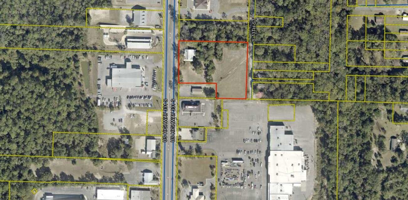 2.39 Acres zoned Commercial (C-1) with 226' of frontage along Highway 331 in
Defuniak Springs, FL. This property is in the path of progress, located near Walmart, Winn-Dixie, Walgreen's, Starbucks, Lowe's, Pizza Hut, Arby's, Take 5 Oil, Car Lots, etc.  This parcel is located just 1.1 miles north of the I-10 exit at Hwy 331. There is an existing brick house on the property that has been recently occupied. It is 2053 square feet.
This opportunity delivers flexibility for retail, mixed-use, hospitality, all supported by the corridor's steady traffic flow. With a clean canvas, the property is poised for swift entitlement and construction, making it a compelling asset for many different future uses.