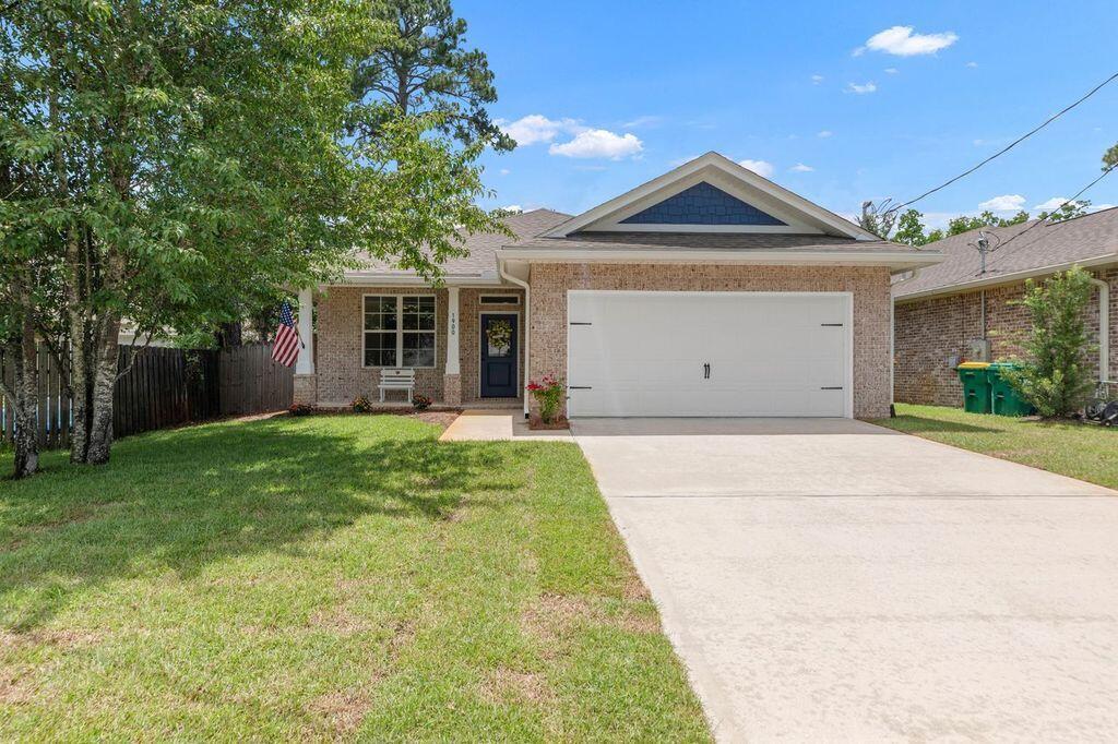 BETTER THAN NEW!  NO Association here!  Room for a poo!  All Brick.  All Brick, open floor plan, 4 bedrooms and 2 bathrooms. in the center of Niceville.  As you walk into your beautiful home, you see your dining room and kitchen, with modern light fixtures and recessed lighting.  The warm kitchen cabinets, granite counter tops, and sizeable bar are perfect for entertaining, or for just enjoying family meals.  The large family room has trayed ceiling, and opens to a large, covered patio in a fully fenced oasis.  The storage building is perfect for storing lawn care items while your children play on the swing set.  French drain has been installed by the sellers, preventing any settling water.  An expansive master suite features trayed ceilings, a large walk-in closet, and an ensuite with a walk-in shower, double vanities, and a linen closet.  A distinct hallway off the main living area accessed three additional bedrooms, and a shared full bath with double sinks.