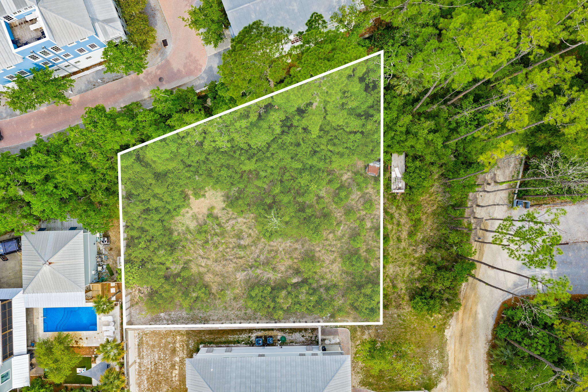 Rare opportunity to secure the last available premium homesite bordering Seaside from coveted Old Seagrove. Nearly a full quarter acre, this exceptional lot offers a combination of size, location, and flexibility that is increasingly difficult to find along Scenic 30A. Zoned residential with no HOA, no build-out timeline, and no restrictive covenants, buyers have the freedom to build on their terms. Multiple beach access points are just a short walk away. Ideal for investors, vacation rental potential, or creating a private primary or second home in one of the most sought-after locations on the Emerald Coast. Positioned where the prestige of Seaside meets the charm and flexibility of Old Seagrove, this homesite offers a rare chance to own premium land in one of the most desirable areas along 30A. Oversized lots this close to the beach are increasingly scarce, making this a compelling long-term investment. Unlike neighboring communities with HOA fees, covenants, and build restrictions, this property allows you to build on your timeline and design to your vision. Ideal for a luxury vacation rental, private second home, or full-time coastal residence. Multiple beach access points, dining, shopping, and entertainment are all nearby, enhancing both lifestyle and rental demand. For buyers watching the 30A market, this is a unique opportunity to secure a limited asset with lasting upside in a location that continues to appreciate.