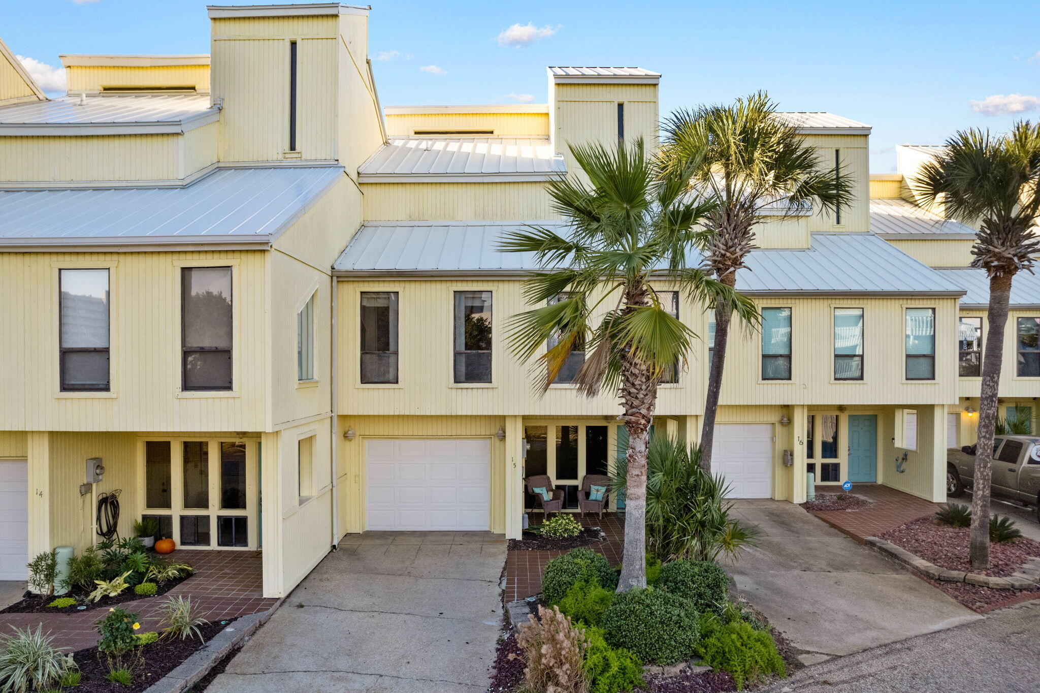 Best of Navarre Beach! Experience the coastal lifestyle with this fantastic unit at the Sound-front community of Buena Vida Townhomes. This rare find offers views of the Sound from almost every room. The spacious floor plan features 3 bedrooms, 2 bathrooms, a versatile bonus room, and a charming loft, providing ample space for family and guests. Boaters will fall in love with the INCLUDED private, deeded boat slip, while the 2-car tandem garage offers plenty of room for vehicles and beach gear. Enjoy the added bonus of the community amenities that Buena Vida has to offer, including a waterfront pool, tennis courts, private beach area, and a private pier. Plus, you're walking distance to all things ''Navarre Beach'' including the iconic Navarre Beach Fishing Pier, the sugary white sands of Navarre Beach, and local dining and entertainment spots!