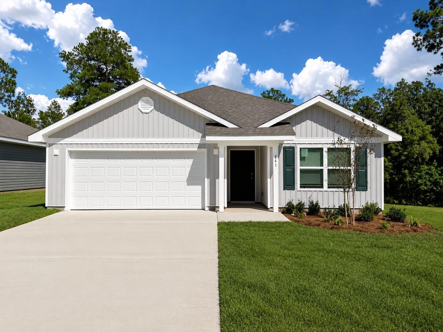 Welcome to 241 Dockside Road, a new home that is ready for move in at Magnolia at the Bluffs in Freeport Florida. The Aria has three bedrooms and two full bathrooms and a covered entry that leads to the bright foyer. Continuing through the foyer you will see EVP flooring leading to the open living area designed with comfort and functionality in minds.

The heart of this home includes the spacious kitchen that features a center island and a walk-in pantry with ample storage space. Beautiful quartz countertops are complemented by the white cabinetry. Appliances include a stove, microwave and dishwasher. The living and dining areas offer a comfortable space for family and guests. Enjoy your covered back patio that is accessible from the dining area that has room for a dining table or outdoor seating area. The primary bedroom is situated at the back of the home and has an ensuite bathroom that features a walk-in closet and all the space you need to get ready in the morning. The primary bathroom has a dual sink vanity with quartz countertops, a separate water closet for privacy and a shower as well as a linen closet. There are two additional bedrooms that have ample closet space and share a full bath. This home also features a nice laundry room with space for a full-size washer and dryer.