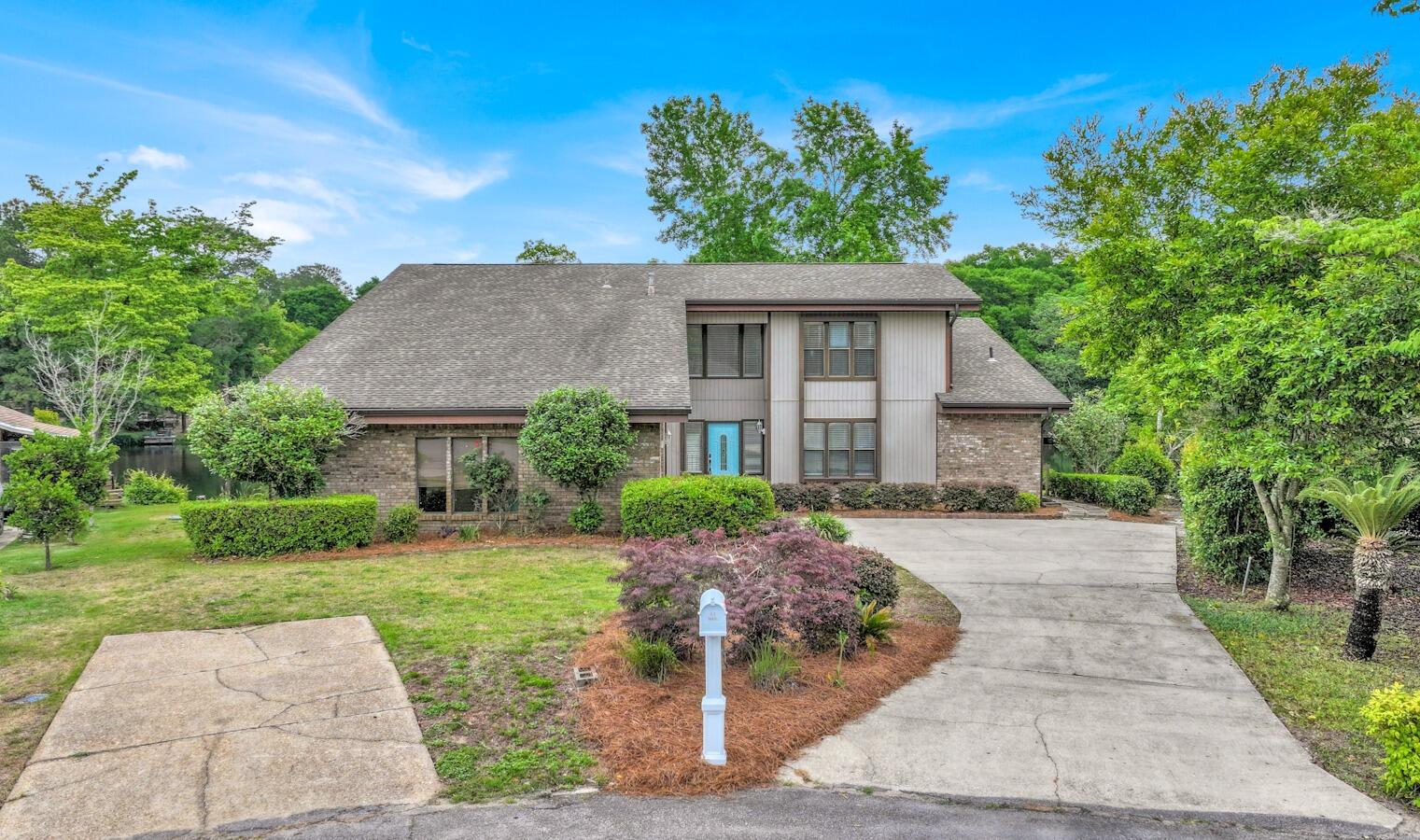 Discover your lakeside sanctuary, a beautifully refreshed retreat in the premier Le Chateau subdivision of Rocky Bayou. This 4-bedroom, 2.5-bathroom home has been thoughtfully updated to provide modern comfort against the backdrop of serene lake views. Step inside to find a seamless blend of style and peace of mind. The home features brand-new LVP flooring in main living areas and plush new carpet in the bedrooms. Both the kitchen and bathrooms have been tastefully updated, complementing the open, airy feel of the vaulted ceilings and dual living spaces. Major mechanical and structural updates ensure worry-free living for years to come: HVAC: Both units replaced in 2025. Septic System: New system and drain field installed in 2021. Roof: Installed in 2018. Water Heater: Replaced in 2016. Prime location & outdoor living nestled on a quiet cul-de-sac, this property offers stunning views of Lake Amick from a spacious back deck. Golf enthusiasts will appreciate being adjacent to hole #3 of the Rocky Bayou Country Club, providing easy access to championship golf and community amenities. Centrally located in Niceville, you are just a short distance from local shops and dining, with an easy commute to Eglin AFB and the famous beaches of the Emerald Coast. Enjoy the best of Florida living with the perfect mix of tranquility and convenience.