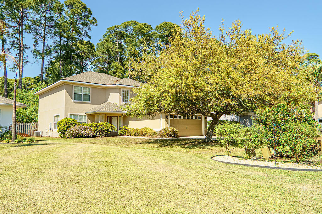 Very well maintained home with a new roof on 10-1-21, new microwave/stove/dishwasher on 8-1-23, exterior repaint on 8-24.  New lawn pump and new garage door opener/spring rollers happened in 2025. Rear screened porch and quite backyard overlooks lots of trees and greenway space. Conveniently located in Sandestin area close to the hospital, Grand Blvd, movie theater.