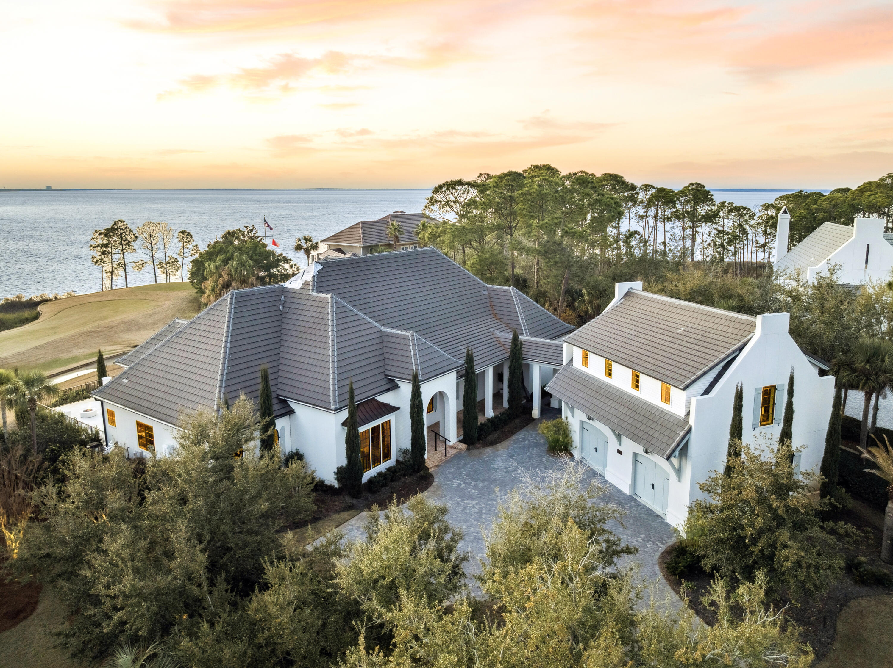The property is under contract with a kickout clause.

Positioned within the exclusive gates of Burnt Pine inside Sandestin Golf and Beach Resort, 3258 Burnt Pine Cove presents an extraordinary opportunity to create a one-of-a-kind custom estate in one of the Emerald Coast's most prestigious and tightly held enclaves.

This property is truly a blank canvas. The existing structure offers the ideal foundation for a complete custom transformation, allowing the next owner to reimagine every space with intention and precision. From architectural style and floor plan to finishes and outdoor living design, this is an opportunity to build a legacy residence tailored entirely to your lifestyle. Whether your vision leans toward modern coastal, timeless Mediterranean, or refined transitional, the  setting supports something truly special.

The homesite itself is the irreplaceable asset. Perfectly positioned to capture unobstructed views of Choctawhatchee Bay, the property enjoys sweeping water vistas that create a constant connection to the natural surroundings. Sunrises shimmer across the bay, evening light reflects off the water, and the sense of openness and tranquility is immediate. In addition to the expansive bay views, the home overlooks the signature 14th hole of the Burnt Pine Golf Course, offering a rare dual perspective of water and championship golf.

This unique combination of bay views and golf course frontage creates a setting that is both dynamic and peaceful. The sightlines are protected, the elevation is strong, and the orientation of the structure maximizes natural light throughout the day. It is increasingly rare to find a property that delivers unobstructed bay views paired with this level of privacy and exclusivity.

Burnt Pine itself represents the pinnacle of luxury within Sandestin. Residents enjoy gated security, seclusion from the resort's busier areas, and access to championship golf, private beach access, a full-service marina, tennis, dining, and the expansive amenities that define the Sandestin lifestyle. It is a community known for its architectural quality, estate-sized homesites, and long-term ownership.

Opportunities to design and customize a residence with unobstructed Choctawhatchee Bay views in Burnt Pine are limited and becoming increasingly scarce. 3258 Burnt Pine Cove offers the chance to create something entirely your own in a setting that simply cannot be replicated, with protected water views, golf course frontage, and the prestige of one of the most sought-after addresses along the Emerald Coast.