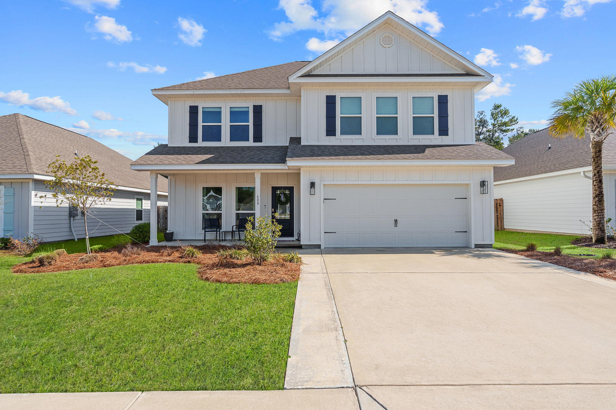 Located in The Preserve at Paradise Cove, 400 JRs Way offers a refined blend of comfort, thoughtful upgrades, and lifestyle-driven location, tucked into a quieter section of the neighborhood where privacy and natural beauty take center stage.

This 4-bedroom, 3.5-bath residence spans 2,487 square feet of well-designed living space, backing to a wooded preserve that creates a peaceful, private backdrop. The spacious backyard offers exceptional potential, and professionally drafted pool plans are already in place, making it easy to envision your own custom outdoor retreat. Whether you imagine a resort-style pool, summer kitchen, or expansive lounge space, the groundwork has already begun. Another useful addition is the EV Charger in the 2 car garage. Inside, natural light pours through the open-concept layout, creating an airy, welcoming atmosphere. The main living area flows seamlessly into the dining and kitchen spaces, ideal for both relaxed evenings and entertaining. The kitchen has been upgraded with a double oven, enhanced countertops, stylish backsplash, and generous prep space for everyday cooking or hosting. Added designer lighting in the dining room elevates the ambiance and creates a warm focal point for gatherings.

The primary suite offers a private sanctuary, complete with a custom-built closet system designed for optimal organization. Two additional bedrooms share a convenient Jack-and-Jill bath, while a fourth bedroom is thoughtfully positioned near a full hall bath, perfect for guests, a home office, or flex space.

Beyond the home itself, the location adds even more appeal. Residents enjoy close proximity to the white sand beaches of the Emerald Coast, the charm and dining of Co Hwy 30A, and convenient access to Choctawhatchee Bay for boating and paddle boarding. A walking path leads directly to Emerald Coast Middle School, offering everyday ease for families. Nearby favorites like Eden Gardens State Park provide historic charm and scenic grounds, while miles of hiking and biking trails connect you to the natural beauty that makes this area so desirable.

With quick access to Highway 98, 30A's beach communities, local dining, and outdoor recreation, 400 JRs Way delivers both lifestyle and convenience, positioned in a community that balances tranquility with connection.

This is coastal living with room to grow, space to relax, and a setting designed for both privacy and possibility.