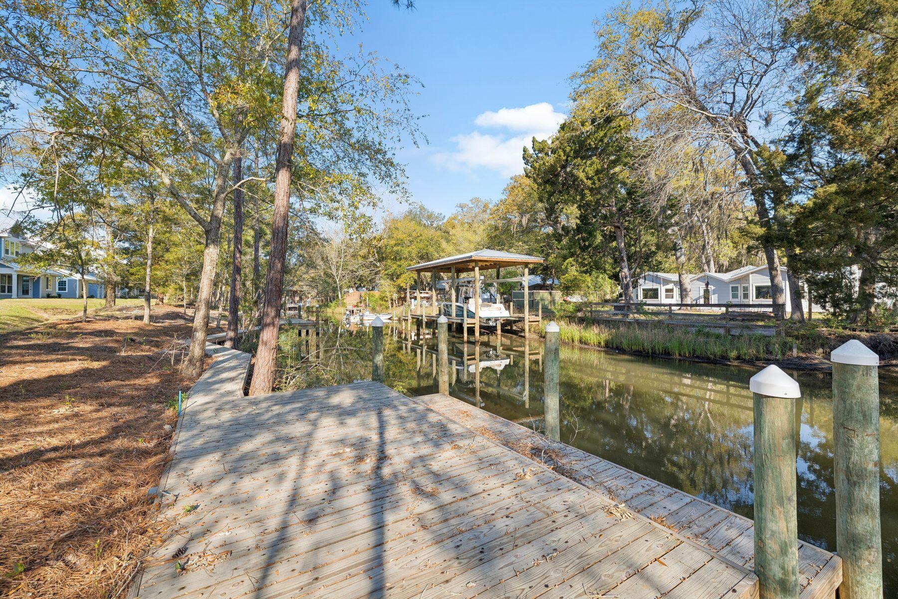 Set along a tranquil canal with direct access to Choctawhatchee Bay, this thoughtfully designed residence brings a rare sense of ease to waterfront living. The expanded floor plan adds meaningful scale where it matters most, creating a home that feels airy, functional, and well-suited to both everyday life and effortless entertaining. With four bedrooms and three full baths, the layout offers generous proportions, refined finishes, and a strong connection to the water at nearly every turn. At the heart of the home, an open-concept living, dining, and kitchen area is designed to make the most of natural light and calming canal views. The enlarged living spaces create a comfortable flow, while the gourmet kitchen elevates the experience with premium finishes, a gas range, and an oversized island that serves as a natural gathering place. An electric fireplace adds warmth and character to the main living area, creating an inviting focal point.

Water views remain a constant presence throughout the home, with the dining area and primary suite, oriented to capture the peaceful setting. The primary suite offers a private retreat with a spacious ensuite bath, while the upstairs laundry room adds practical convenience to the home's well-executed design.

Outside, a covered porch extends the living space and provides the perfect setting for quiet mornings, casual evenings, and breezes drifting in from the bay. Combining an improved layout, quality construction, and direct bay access, this residence offers an exceptional opportunity to enjoy waterfront living with comfort and style. Centrally located near shopping, dining, and the beach, it places the best of the coast within easy reach.