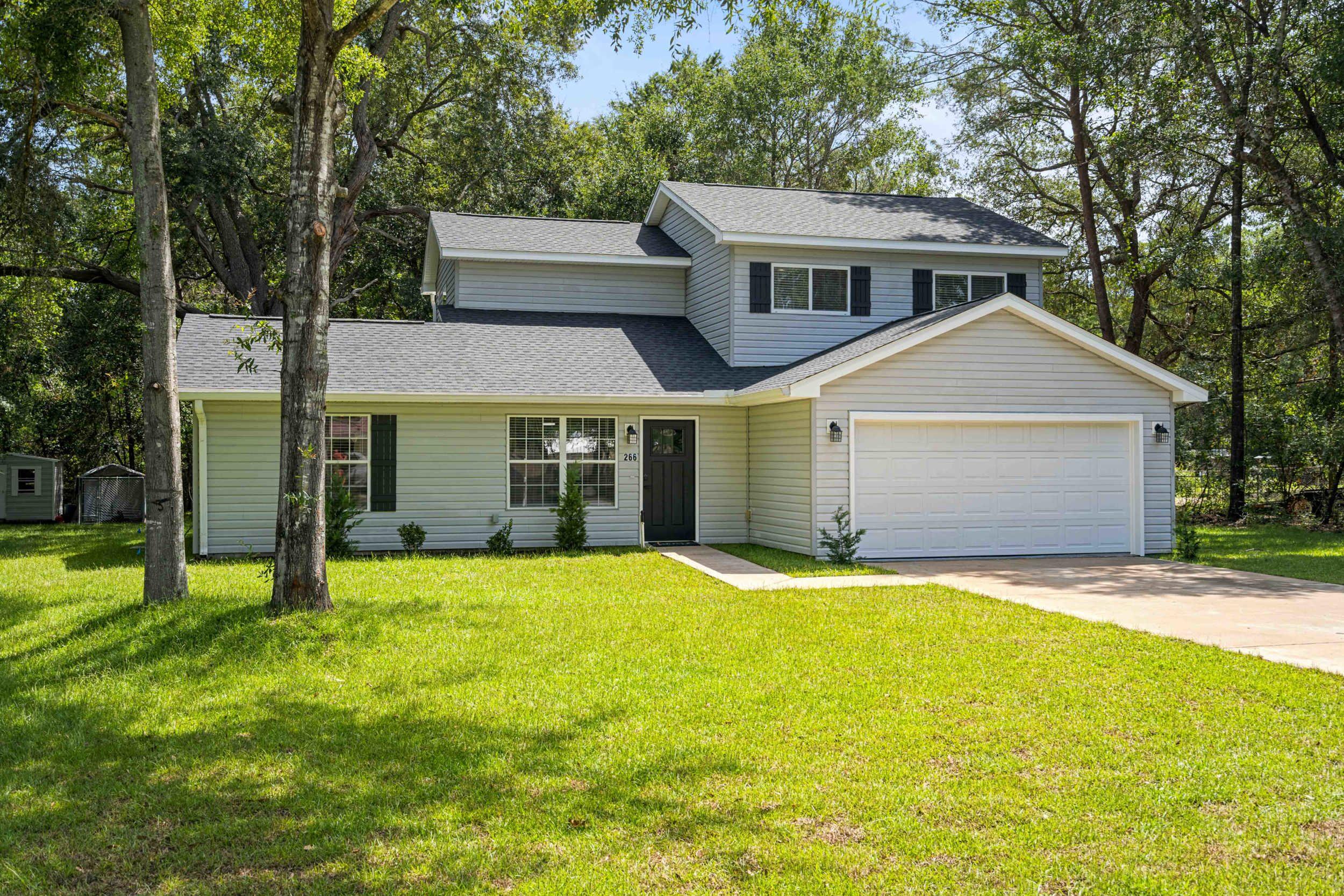 Private, well-kept 4BR/2.5BA home on a spacious lot in Magnolia Landing with no HOA fees, fenced backyard, RV/boat parking, and a back porch for outdoor living. Inside you'll find 1,800 sq ft, a 2026 roof, 2026 water heater, newer AC system with separate zones which was recently serviced, irrigation system, pressure-washed exterior, painted garage, and a hot tub. Move-in ready, and conveniently located near Hammock Bay with easy access to Hwy 331 and the beaches/30A.