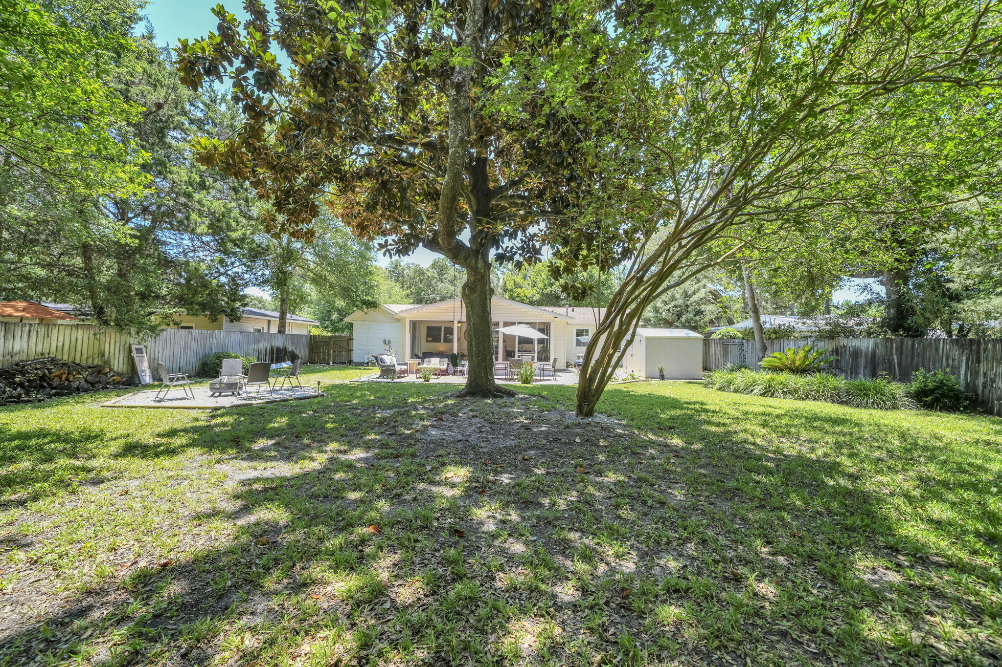 Rare opportunity in desirable Elliott Point! GENERATING $48,000 NET RENTAL INCOME IN 2025, this fully furnished Home is perfectly positioned near the bay, boat launch, dining & downtown FWB offering an exceptional opportunity as an Investment property, 2nd HOME WHICH OFFSETS COSTS/ PAYS FOR ITSELF, or Primary Home.  Inside, you'll find a spacious open floor plan w/large living area, separate dining rm & split-BR design w/a private primary suite tucked away from the other BR's.. The beautiful NEW primary bathroom features a large walk-in shower, & dual vanities, & a large walk-in closet w/stylish barn doors accents the primary suite. A 2nd NEW bathroom serves the add'l BR's.  Need extra space? A bonus room w/closet & laundry area offers flexibility as an office, gym, bunk room, or hobby space.  The backyard is designed for the Fl. lifestyle.  Enjoy morning coffee on your tiled screened porch, gather friends around the fire pit & entertain w/ease on the expansive patio w/both outdoor dining & lounging areas.  Surrounded by mature foliage & natural views, the oversized fenced yard provides a private retreat rarely found this close to downtown & the bay.   A 2019 roof, 2018 HVAC, 2022 HWH & new sprinkler system add peace of mind & insurance savings.  Whether you're looking for a successful vacation rental, weekend getaway near the bay WHICH PAYS FOR ITSELF, or a place to call home, this Elliott Point Home offers location, lifestyle & value all in one package.