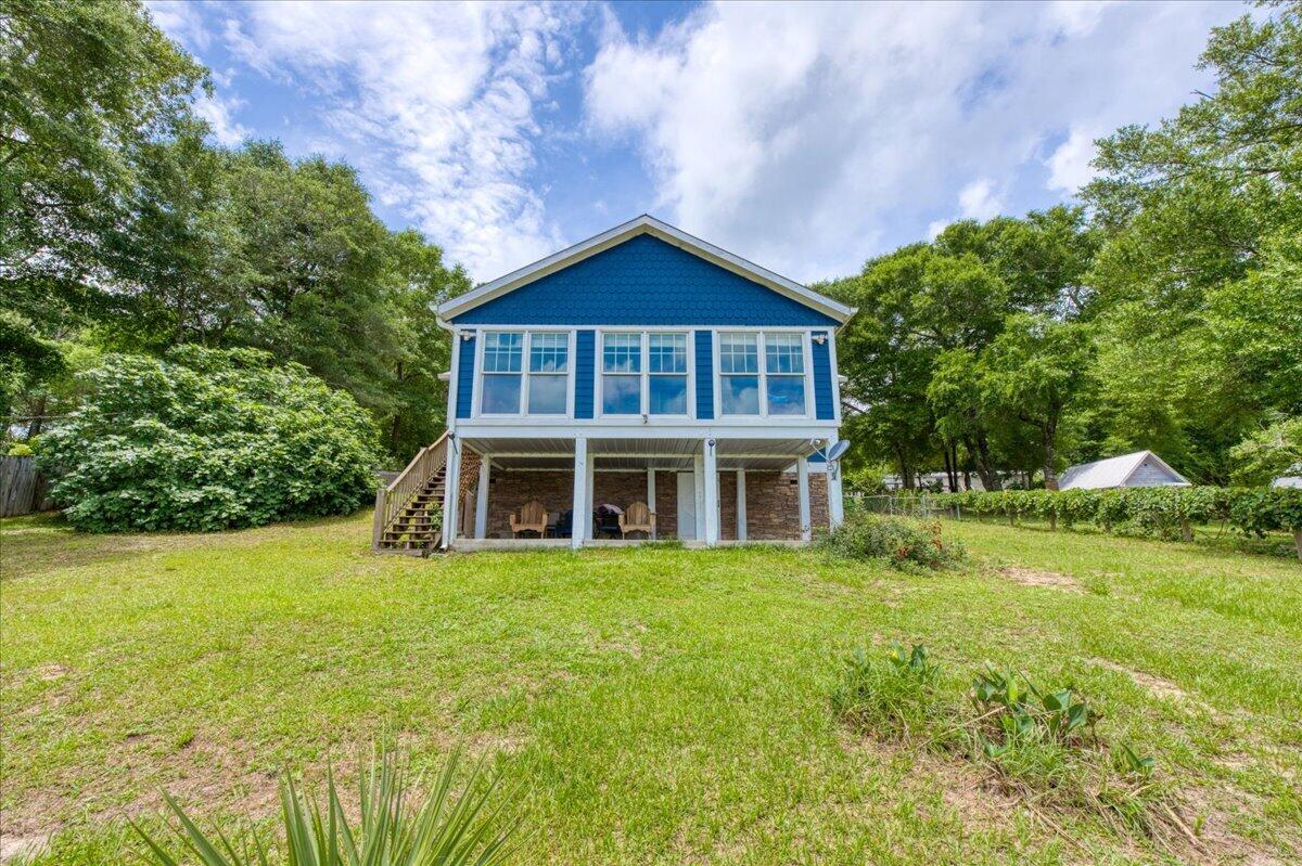 **Waterfront Living with Farmhouse Charm on Kings Lake**

Welcome to your own private waterfront retreat on beautiful Kings Lake. Situated on two lakefront lots, this charming 3-bedroom, 2-bath home blends rustic farmhouse character and modern updates.

Inside, you will find fresh interior and exterior paint, new flooring throughout, and a spacious living room addition featuring warm pine walls and expansive windows that frame peaceful lake views.  The updated kitchen and dining area showcase farmhouse inspired with unique tin accents, a custom breakfast bar, and a striking accent wall.  Stainless steel appliances were installed in 2022.

The primary suite offers a walk-in closet with ventilated shelving and built-in storage drawers. Additional improvements include a new HVAC system (2020), new fencing, gutters and an irrigation system.

Whether you're enjoying your morning coffee overlooking the water, fishing from your backyard, or simply relaxing in the tranquil setting, this property offers the lakefront lifestyle you've been dreaming of.  A rate opportunity to own a waterfront home with character, comfort and breathtaking views.