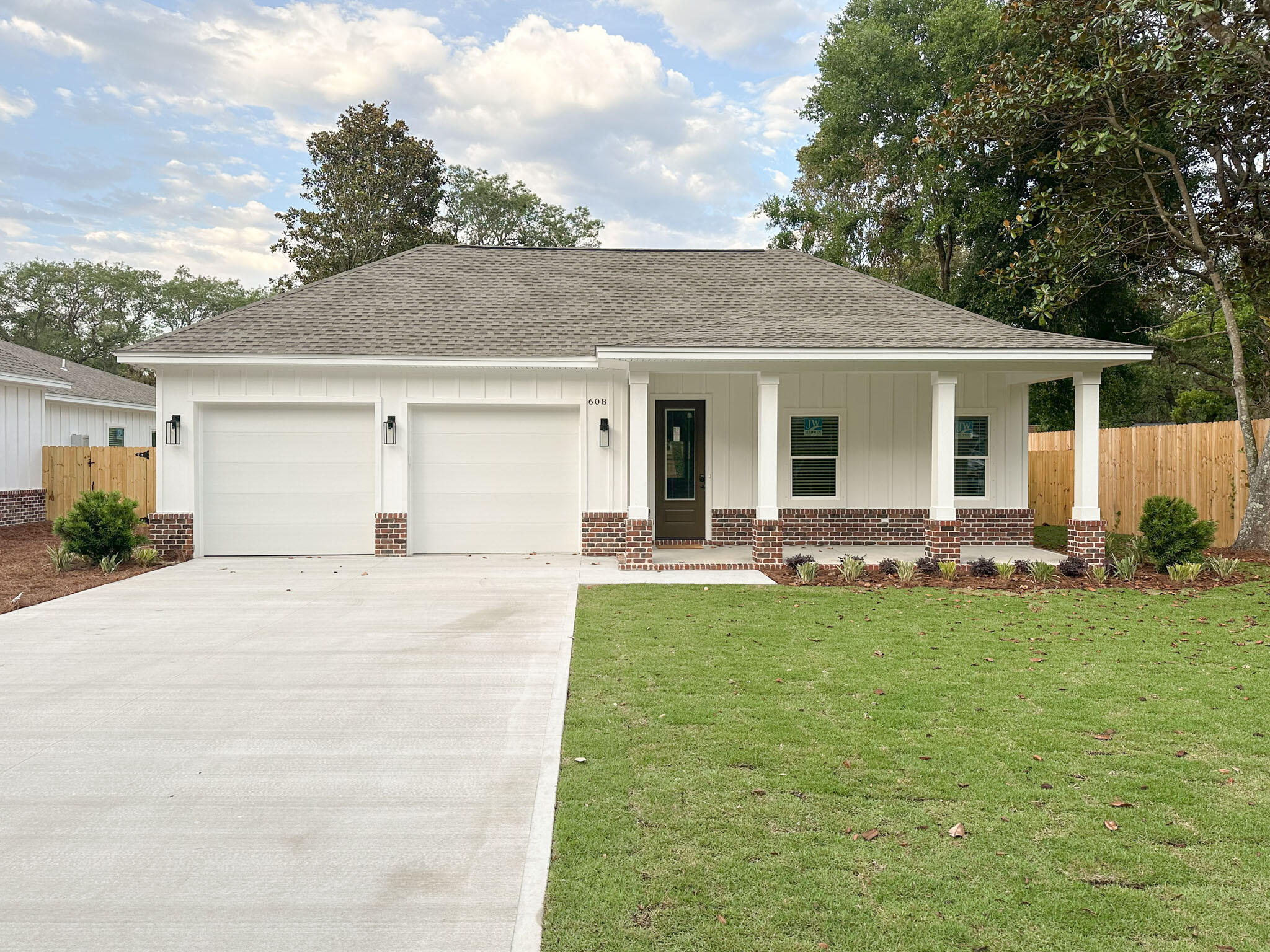 This beautiful home featuring 4BD/3BA has all the bells and whistles you could ask for. No carpet, luxury vinyl plank flooring throughout, stainless steel appliances, granite countertops and window treatments, just to name a few. The kitchen is open and airy and overlooks the living room and beautiful back yard, which makes for perfect for entertaining. The substantial master bedroom, with a large walk in closet and a master bath that features a double vanity, a garden tub, a walk-in shower and a separate water closet. The guest bedrooms and baths are spacious. A washer and dryer are included as well as a 2-car garage that features a car charger for those that have an electric vehicle. Sit on your back porch and look at the large fenced-in yard that is filled with palm and magnolia trees.

Basic lawn care included. Tenant pays all utilities. Holding fee is due within 24hrs of approval. Lease must start within 14 days of payment. Lease Prep Fee of $75 is due prior to move in. Approved pets require $400 pet fee per pet. Renters insurance is required. Property is available for a 12-month lease. Sorry, no cats.