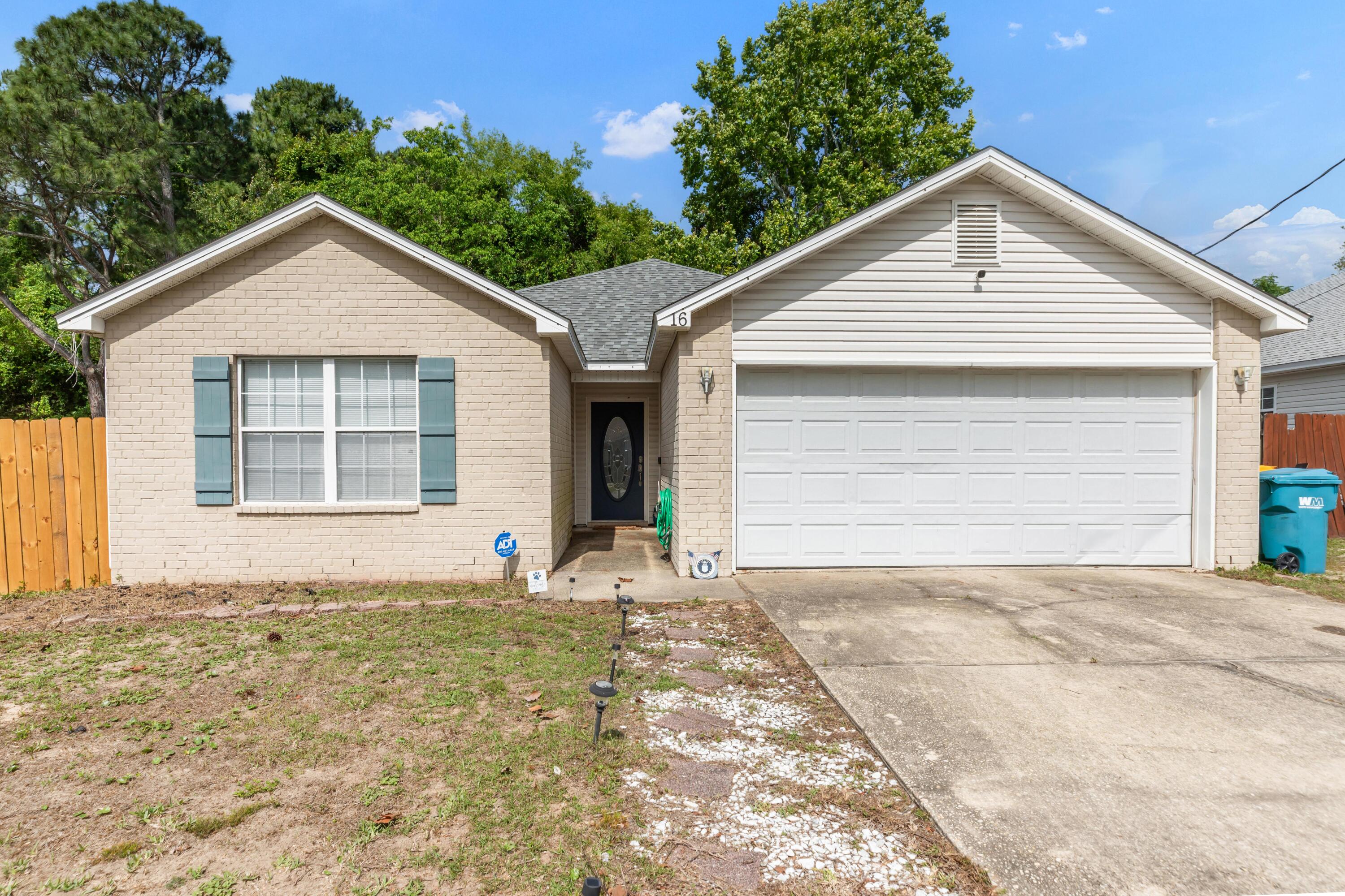 Just minutes from the base gate, you'll love this 3-bedroom, 2-bathroom home with a 2-car garage tucked away on a quiet non-through street. Major updates include a roof replaced in 2020 and a 2022 HVAC system for added peace of mind.The spacious primary suite features a walk-in closet, double vanity, separate tub, and walk-in shower. The large fenced backyard includes a concrete slab perfect for entertaining, grilling, or outdoor seating. Inside, the home offers vinyl plank flooring in the living areas and tile in the wet areas, including the kitchen and bathrooms. Best of all, no HOA.