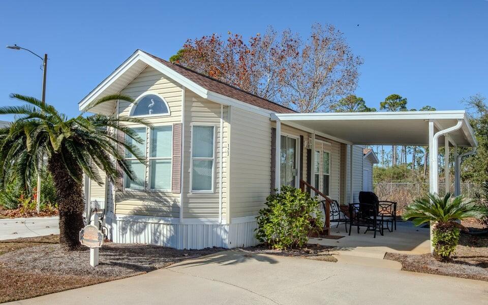 *Looking for an affordable second home or income-producing vacation rental? This is one of the best-priced properties on the beach! *This 1-bedroom, 1.5-bath home in Emerald Pointe Resort offers everything you need for the perfect coastal getaway. The home has been well maintained and features a new roof, new appliances, new A/C (2021), LVP flooring (2020), fresh interior paint (2020), water heater (2016), and an 8x8 storage building (2016). *One of the most unique advantages of Emerald Pointe is that you own both the home and the land�a rare find in a resort community. With low HOA fees, you can enjoy it as your personal retreat or use it as a vacation rental for additional income. *Emerald Pointe Resort is a beautifully maintained community offering two pools (one heated), hot tub, playground, shuffleboard courts, fitness center, community room, organized activities, and professional on-site management and so much more. *An incredible opportunity at an unbeatable price. Schedule your showing today!