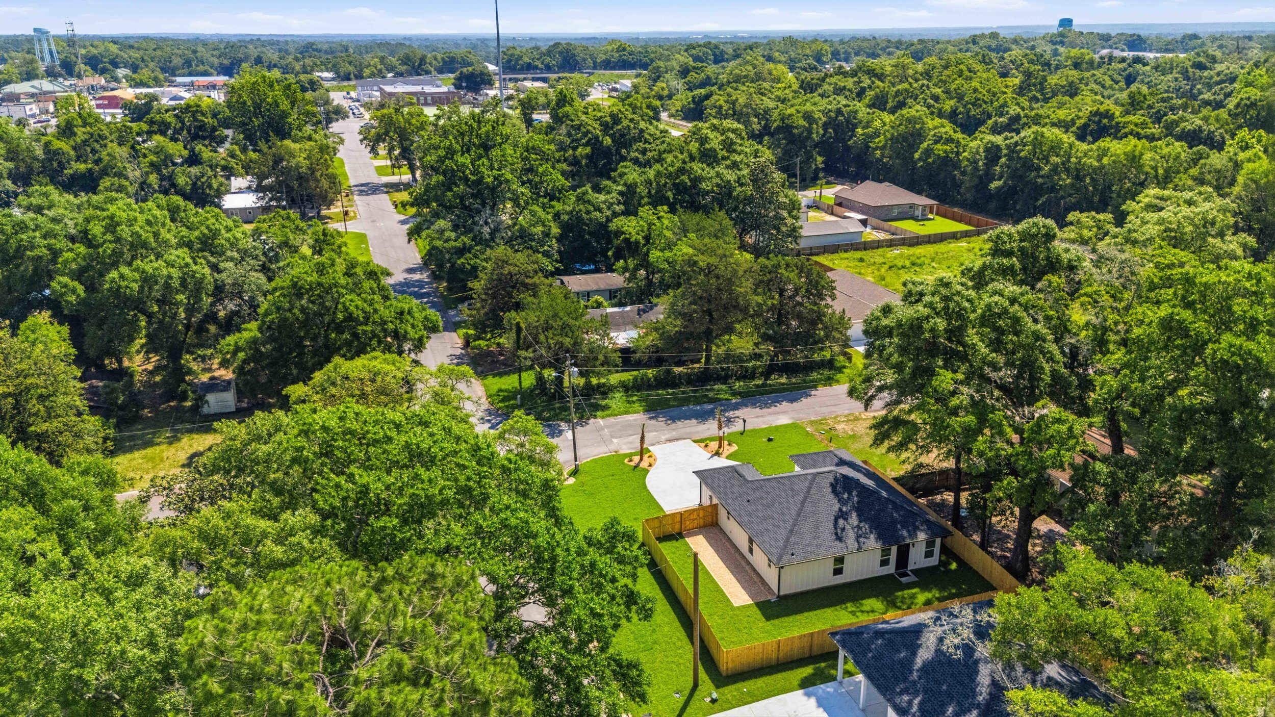 This affordable 4-bedroom 2 bath is a dream! It is not your typical spec home, and you'll be able to tell the quality of the home upon entering!  The ceilings are high giving it a grand feeling, all LVP flooring throughout, TV, Fireplace, soft close drawers, canned lights with all of the appliances and privacy fence!

 It's moments from downtown Crestview and the splash pad, less than 3 from twin hills municipal park, less than 22 miles from Eglin AFB, 30 From Hurlburt Field and only 8 from Duke! Come check it out while it lasts!!