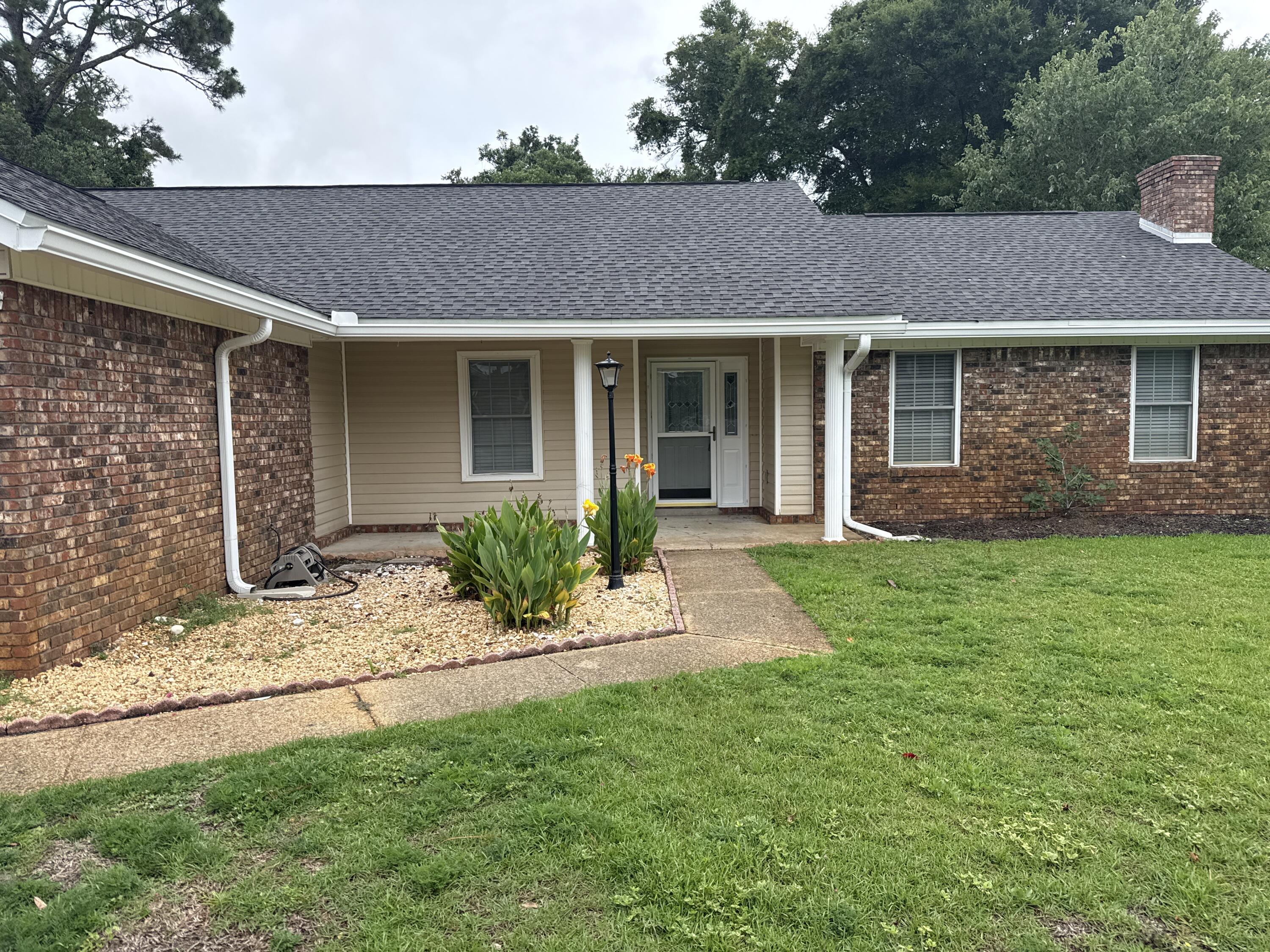 Mary Esther Manor neighborhood. This area features sidewalks and fenced park directly across the street. Easy access to both bases. Privacy fenced back yard with open patio. Interior has 3 bedrooms 2 full baths, wood burning fireplace and vaulted ceilings in the living room. Convenient to shopping and dining. Pets allowed with owner approval and non refundable pet fee.
