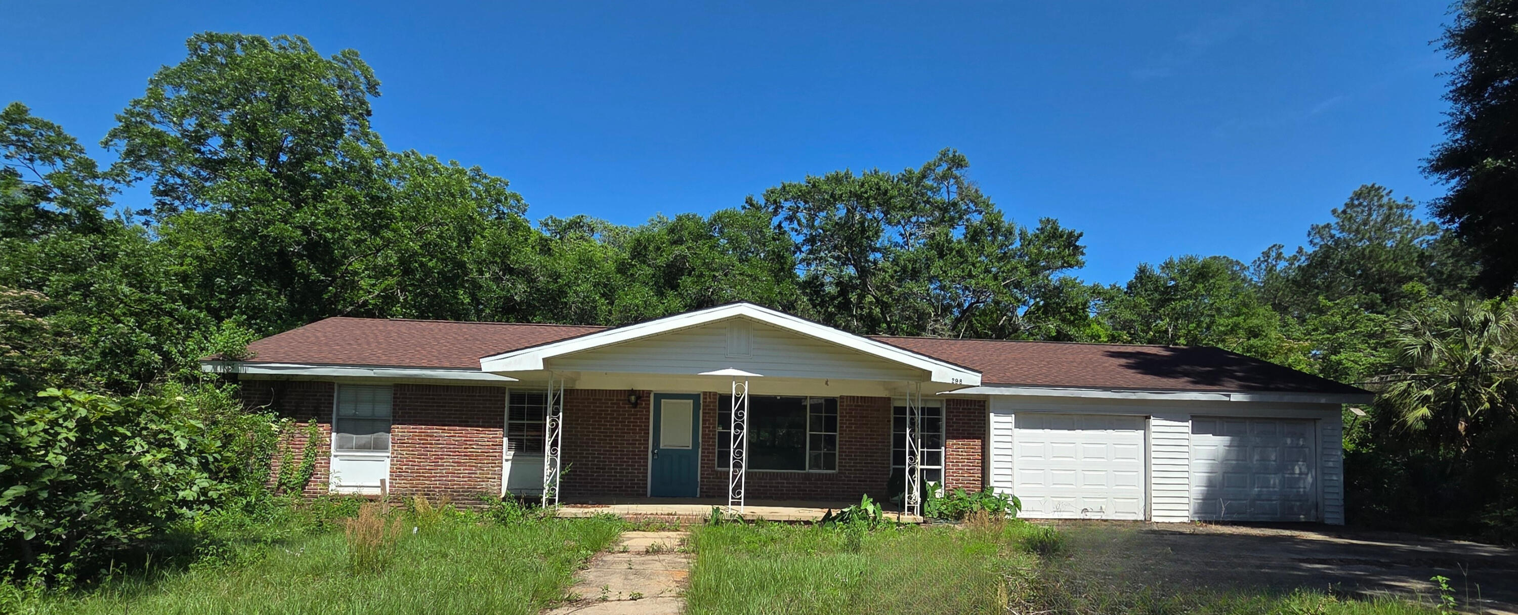 Where can you find 4.21 acres inside the city limits of Crestview with privacy, mature trees, and room to create your dream retreat? Right here. Tucked away on a rare 4.21-acre parcel in the heart of Crestview -- surrounded by the city, yet offering your own private slice of nature -- this 1968 home is full of character, peaceful country charm, and endless potential. The home has great bones and includes a semi-finished basement with an additional 1,269 sq ft of flexible space and opportunity, but it's ready for renovation and restoration. Whether you choose to update and reimagine the existing home into your own private retreat or tear down and build new, the possibilities here are wide open. The true value lies in the beautiful, unspoiled 4.21 acres -- an incredibly rare find in Crestview with room to roam, dream, and create. The acreage also offers potential opportunities to split the property for additional homesites, future development, or resale possibilities. A small creek runs along the backside of the property, adding to the peaceful natural setting and private wooded feel. Whether you envision building your Southern dream estate, creating a mini homestead, artist's retreat, garden oasis, or simply disappearing into the woods for a little peace and privacy, this property offers endless potential. It's the perfect opportunity for anyone wanting land and privacy without paying massive acreage premiums. Mature trees, open space, and the hard-to-find acreage create a  setting that feels worlds away while still being conveniently located IN town. Properties like this rarely come available in Crestview. Bring your vision, creativity, and a little TLC to unlock the full potential of this unique property. Shown by appointment only. Property is being sold AS-IS. Photos have been edited to remove Debry and personal items in home