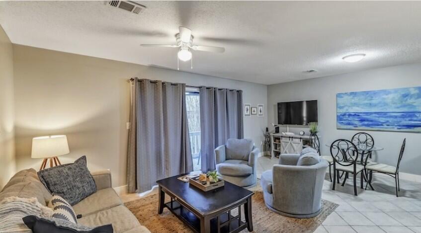 Welcome to this charming condo in the heart of Seagrove Beach, ideally located just across the street from the sugar-white sand and emerald waters that make Scenic Highway 30A so beloved. Whether you're planning a relaxing beach getaway with family or friends, this fully furnished, move-in-ready retreat offers everything you need.

The thoughtfully designed floor plan features one comfortable bedroom plus two built-in bunk beds, providing plenty of space for guests. The spacious living area is filled with natural light and opens through sliding glass doors to a private, covered balcony. Overlooking the pool, tennis courts, picnic area, and beautifully landscaped courtyards, it's the perfect spot to enjoy your morning coffee or unwind after a day at the beach.

The well-appointed kitchen features stainless steel appliances, ample cabinet space, and a convenient breakfast bar for additional seating and casual dining.

Beach access is just a short walk across the street, making it easy to spend your days soaking up the sun and surf. Community amenities include two swimming pools and tennis courts, offering even more ways to relax and enjoy the coastal lifestyle.