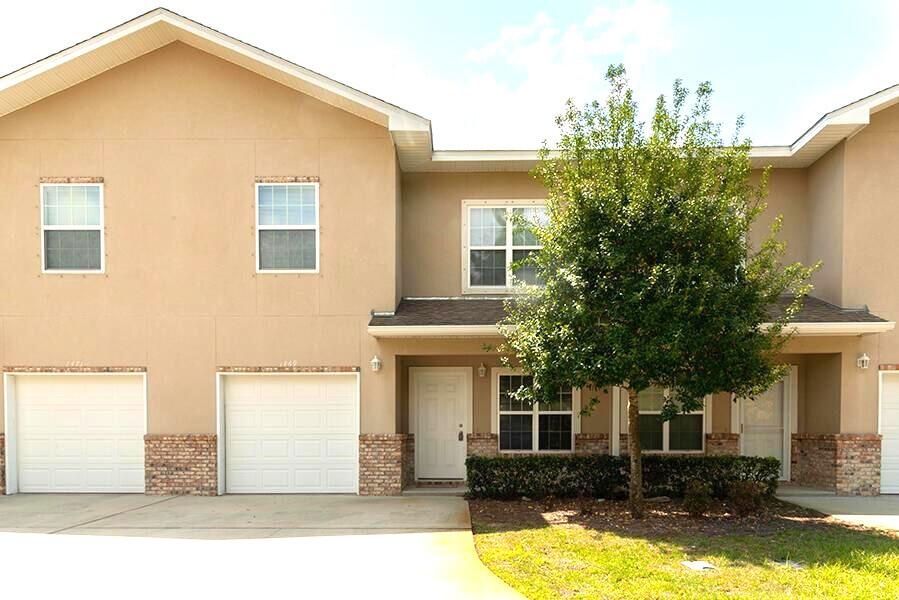 Right outside the back gate of Hurlburt Field and convenient to Eglin AFB as well! This stunning 3-bedroom townhouse offers an expansive 1882 sq ft of beautifully designed living space, perfect for those seeking comfort and style. With two full baths and an additional half bath, convenience is at your fingertips, ensuring ample space for family and guests. The location of this home places you within reach of the best that Fort Walton Beach has to offer, from vibrant attractions to serene beaches. Designed for modern living, this townhouse invites you to experience a lifestyle of ease and enjoyment. Embrace the charm and comfort of 1469 Bentley Circle, where every day feels like a getaway. Sorry no pets. All Coastal Realty Services residents are enrolled in the Resident Benefits Package (RBP) which includes renters insurance, HVAC air filter delivery (for applicable properties) and our best-in-class resident rewards program, and much more!