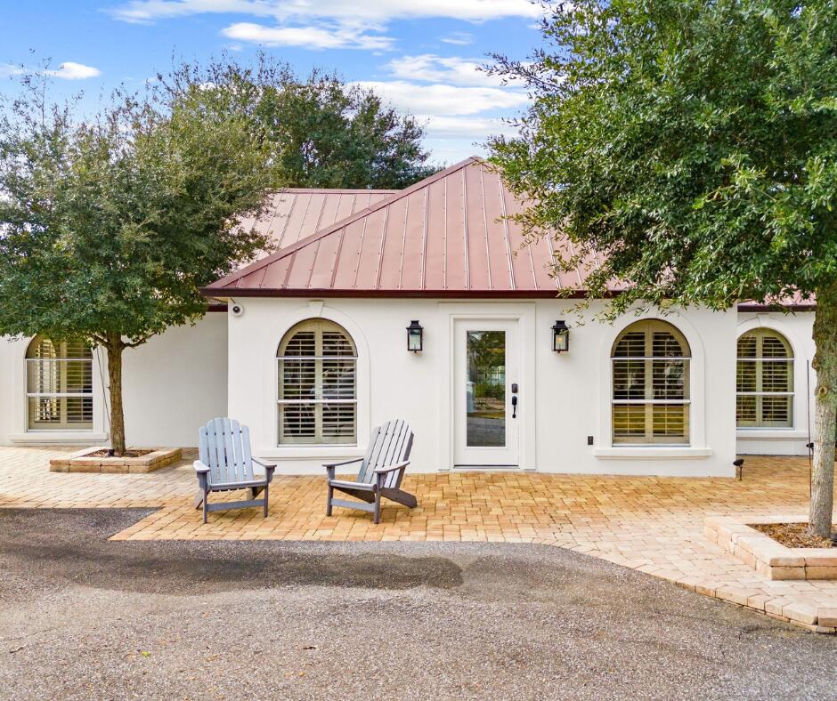 Open your business in this stand alone building directly on 30A! Zoned Village Mixed Use!! This renovated office currently has 6 private offices, a living room, bathroom, copy area, and kitchenette. Shiplap wood walls, picture windows between offices for ample natural light, tile floors, skylights, back deck, too many features to name! The possibilities are endless! Coffee shop, Insurance Company, Real Estate, Property Management, Attorney's office, Gift Shop, and so many more options! The parking lot has room for 5-6 cars. Bring your business to life along the Panhandle's most prominent and prestigious roads!