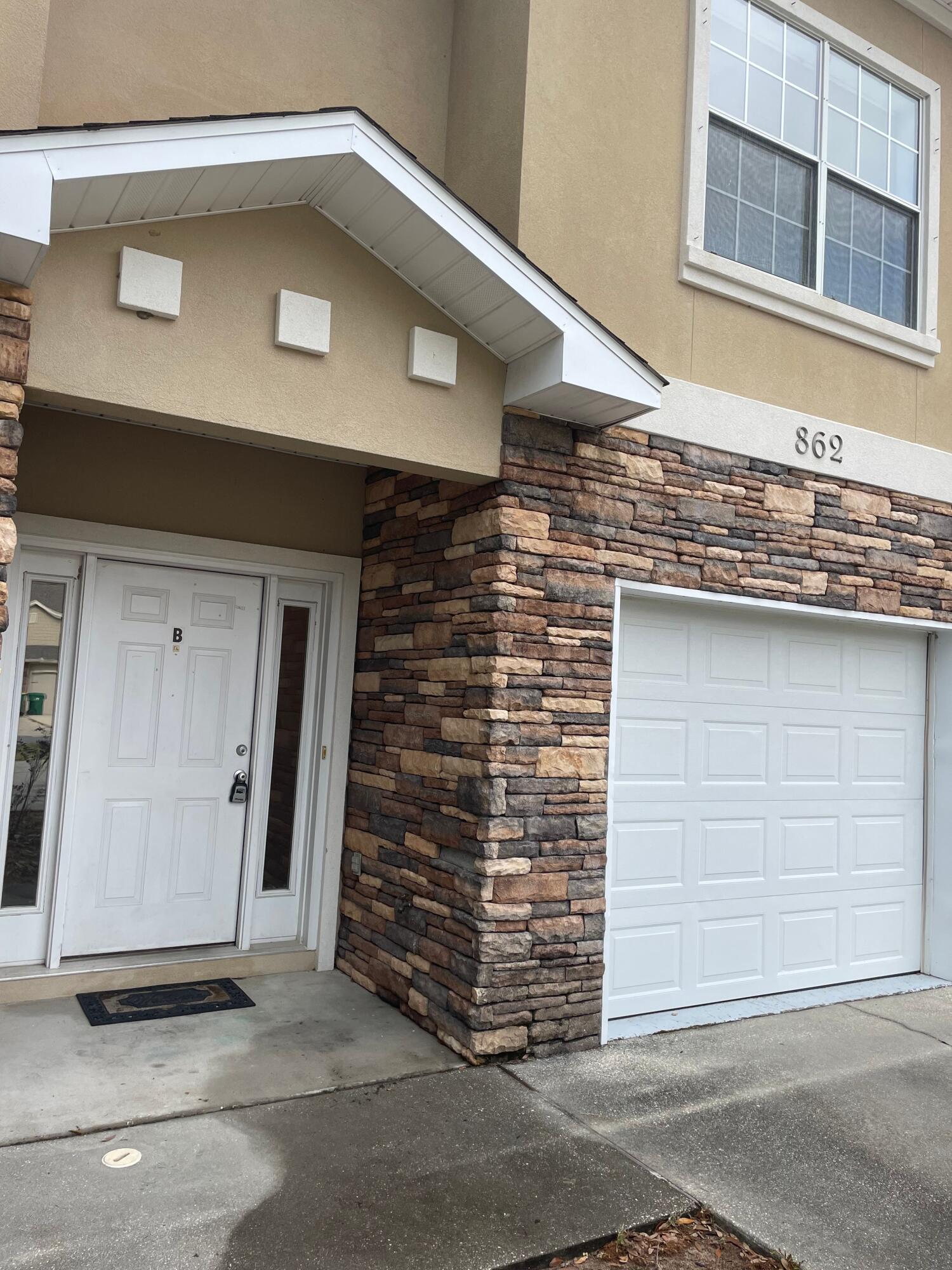 This three bedroom, two and a half bathroom townhouse is centrally located in Fort Walton Beach, Florida. Built in 2008, this unit features granite counter tops and stainless steel appliances. The Master bedroom has two connecting closets and the Master Bath features a double granite vanity. Park your vehicle in the one car garage with an automatic opener.
