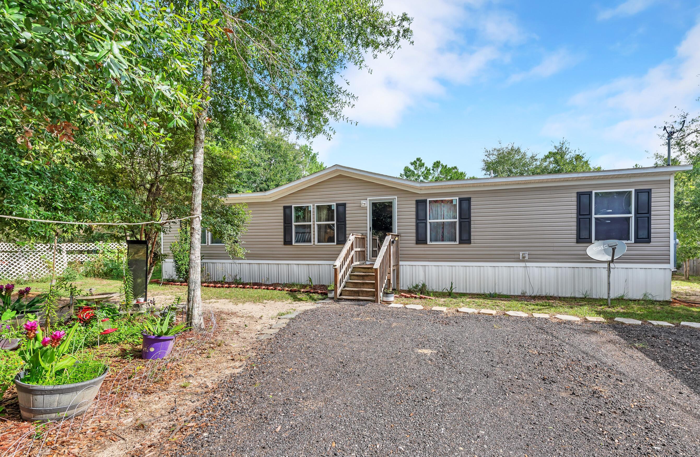 Welcome home to this spacious 4-bedroom, 2-bathroom property offering comfort, functionality, and outdoor enjoyment. Inside, you'll find a well-designed floor plan with plenty of room for family and guests, plus a dedicated space that's perfect for a deep freezer or additional storage.

With this home being only a few minutes from downtown, less than an hour away from  the local beaches and less than an hour from the militray bases its in the perfect spot.

Step outside to enjoy the backyard, featuring a covered back porch area, an above-ground pool, and a trampoline--ideal for entertaining or relaxing with family and friends. The property also includes two storage sheds, providing ample space for tools, lawn equipment, or hobbies.

As an added bonus, the seller is offering $5,000 toward the buyer's closing costs, prepaids, or rate buy-down with an acceptable offer, making this home an even better value. Don't miss the opportunity to make this versatile property your next home!