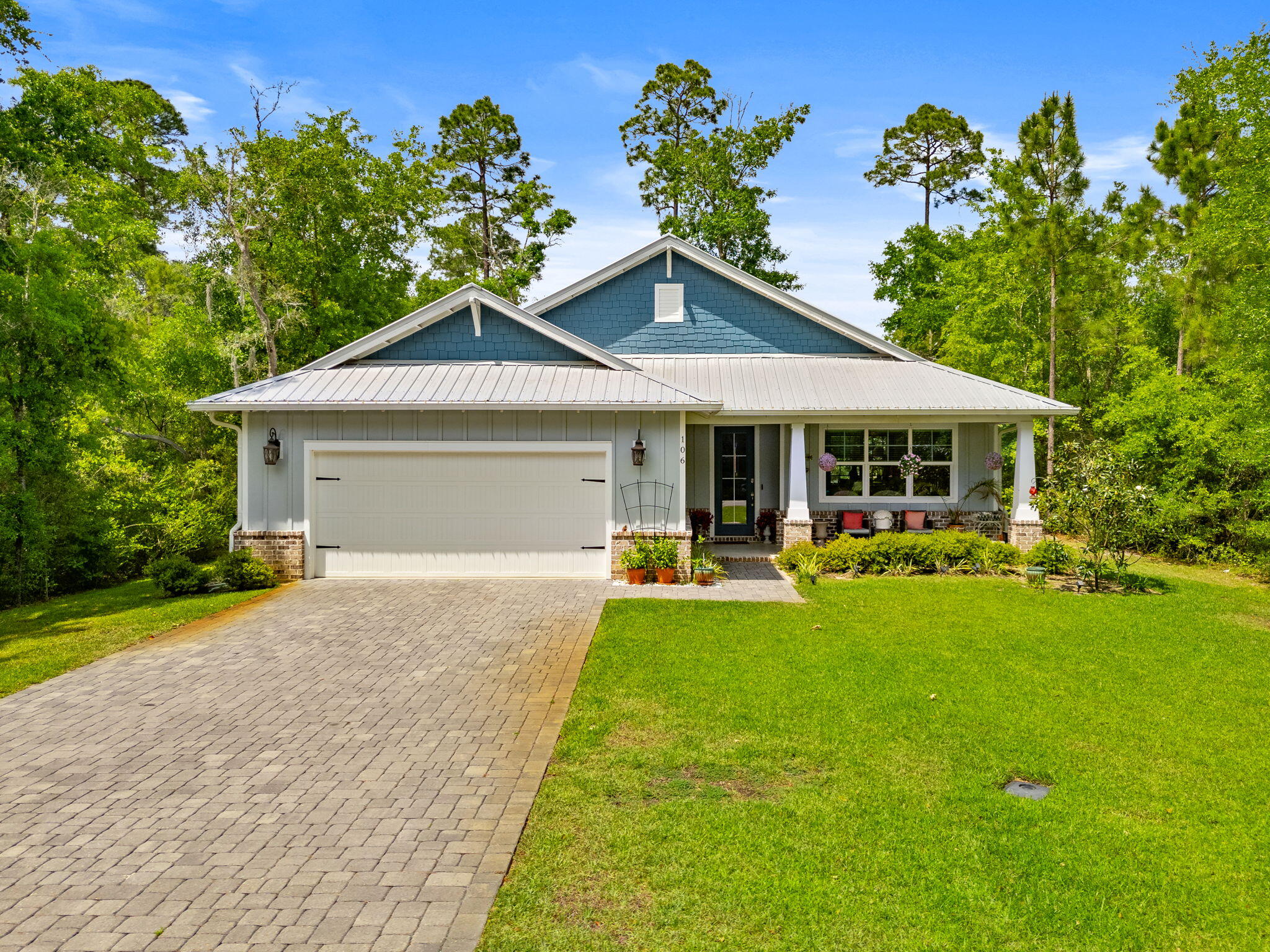 Welcome to 106 Hibernate Way, located in the highly sought-after gated Bear Creek community. This beautifully designed 3-bedroom, 2.5-bath home with a dedicated office offers a truly unique floor plan, centered around an open-concept kitchen and living space. This home is perfect for both everyday living and entertaining.
Inside, you'll find thoughtful custom wood accents throughout, including shiplap and tongue and groove ceilings, adding warmth and character to the home. The gourmet kitchen is a standout feature, complemented by a private wet bar.
The spacious primary suite is a true retreat, featuring a luxurious en-suite bathroom with a double vanity, deep soaking tub, walk-in shower, private water closet, and oversized his-and-her walk-in closet. Additional features include wood-look tile flooring throughout, ceiling fans in all bedrooms, and a functional mudroom with washer and dryer. The home is also equipped with a Tesla EV charger for modern convenience. Step outside to a screened-in back porch overlooking a fully fenced backyard, complete with a WiFi-controlled sauna.
Residents of Bear Creek enjoy access to two amenity centers featuring resort-style pools, pickleball and tennis courts, basketball courts, a fitness center, and playgrounds.

This home is offered unfurnished.
Landscaping is included. (Hot tub not included.)

Home is managed by the owner. Please contact the management company for showings and lease details.