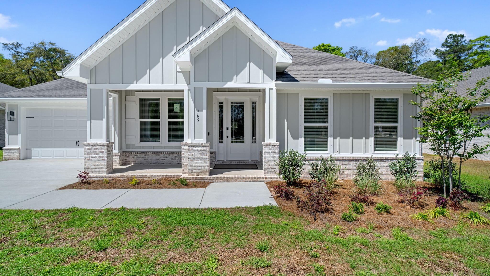 Wake up to the sound of still water and birdsong on this breathtaking bayou-front property, with direct access to Choctawhatchee Bay right outside your back door. Tucked away on a lushly wooded .70-acre lot, this is the kind of rare, unspoiled waterfront setting that's nearly impossible to find in Santa Rosa Beach -- mature trees, total privacy, and stunning water views in every direction. Never-lived-in and built in 2025, this gorgeous 5-bedroom, 3-bath home delivers 3,129 square feet of coastal craftsmanship, complete with a boat dock, covered porch, 2-car garage, and designer finishes throughout. Launch from your backyard,  fish from your own dock, or simply sit and watch the bayou come alive, (even dolphins have been spotted)-- this is peaceful, private waterfront living at its absolute finest. Just minutes from 30A beaches.  From the moment you arrive, you'll be captivated by the home's inviting presence, new construction quality, and thoughtfully designed layout that blends comfort, function, and modern coastal style. Step inside to a light-filled open-concept floor plan featuring a welcoming foyer, a formal dining room, and a dedicated breakfast room perfect for both everyday living and entertaining. The expansive living area flows seamlessly into a chef-inspired kitchen with brand-new appliances, modern cabinetry, and premium finishes.
A versatile bonus flex space offers the perfect opportunity for a home office, study, or media room, providing flexibility for today's lifestyle needs.
The spacious primary suite offers a private retreat with spa-like features, while four additional bedrooms provide ample space for family, guests, or multi-generational living--all finished with clean, modern design and high-quality craftsmanship throughout.
Enjoy true Florida waterfront living with both a large covered front porch and an expansive covered back porch, ideal for relaxing, entertaining, and enjoying peaceful water views and coastal breezes. The backyard flows naturally toward your private boat dock with direct access to the bay, making boating, fishing, paddleboarding, and sunset cruises effortless.
Set on almost an expansive private lot, this property offers exceptional room for a future pool, outdoor kitchen, or custom outdoor oasis.