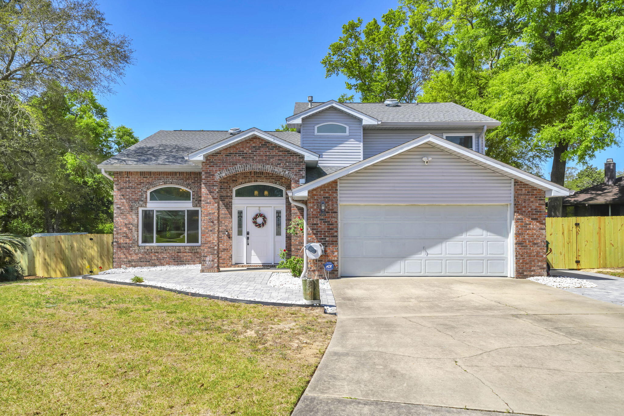 This Rocky Bayou Stunning POOL home is tucked in a quiet cul-de-sac with tons of UPDATES! Click on the Video. 4 bed, 2 1/2 bath w/ 2 spacious living rooms, dining rooms, loft & screened in porch. .43 of an acre w/ no neighbors in the back, just green space!. Fence 2026, all New Hurricane Impact windows & doors 2020, New Roof with Gutters 2021, Solar Panels 2021 (PAID OFF). Gunite, salt water  Pool with custom paver patio and walkway 2020, New HVAC 2020, New Trex deck 2020, New Water Heater 2020. Remodeled kitchen 2020. Completely remodeled stairwell 2024. New LVP 2020 & upstairs 2023. Remodeled 1/2 bath and UP full bath 2025, both w/ New vanities, plumbing fixtures, flooring & lights. Plus full bath- new bathtub, shower tile & pocket door. New custom molding, fresh paint & new Lighti lighting. Very long driveway for all your family and guest. One of the largest lots in the neighborhood! Minutes away from shopping, parks, restaurants, A+ schools, and the sugar white sand of Destin, FL. Easy commute to Eglin AFB, Duke Field,7th Special Forces & Navy EOD School.