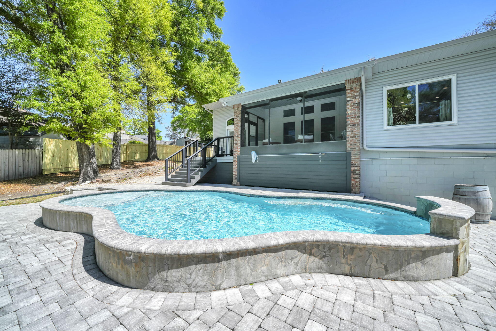This Rocky Bayou Stunning POOL home is tucked in a quiet cul-de-sac with tons of UPDATES! Click on the Video. 4 bed, 2 1/2 bath w/ 2 spacious living rooms, dining rooms, loft & screened in porch. .43 of an acre w/ no neighbors in the back, just green space!. Fence 2026, all New Hurricane Impact windows & doors 2020, New Roof with Gutters 2021, Solar Panels 2021 (PAID OFF). Gunite, salt water  Pool with custom paver patio and walkway 2020, New HVAC 2020, New Trex deck 2020, New Water Heater 2020. Remodeled kitchen 2020. Completely remodeled stairwell 2024. New LVP 2020 & upstairs 2023. Remodeled 1/2 bath and UP full bath 2025, both w/ New vanities, plumbing fixtures, flooring & lights. Plus full bath- new bathtub, shower tile & pocket door. New custom molding, fresh paint & new Lighti lighting. Very long driveway for all your family and guest. One of the largest lots in the neighborhood! Minutes away from shopping, parks, restaurants, A+ schools, and the sugar white sand of Destin, FL. Easy commute to Eglin AFB, Duke Field,7th Special Forces & Navy EOD School.