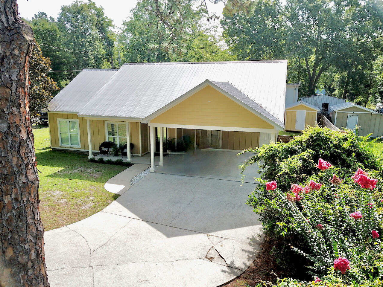 Welcome to this charming and spacious home in the heart of Freeport! This property blends comfort, convenience, and functionality, making it an incredible opportunity for homeowners seeking both style and practicality. 

The home features 

*A durable metal roof.

*Privacy fence for backyard relaxation and security.

*Extra carport for boats/additional vehicles.

*Exterior shed for tools/storage.

*Cathedral ceilings that create an open, airy feel.

This home's location is a standout feature. Enjoy the convenience of being just minutes from:

*Local schools and parks.

*Grocery stores, shopping, and dining.

*Freeport marina and Choctawhatchee Bay.

*Scenic Hwy 331 for easy access to the white-sand beaches of South Walton.

Whether you are looking for a family home or a peaceful getaway close to town, 193 Polk St offers the best of small-town living with all the amenities you need nearby.