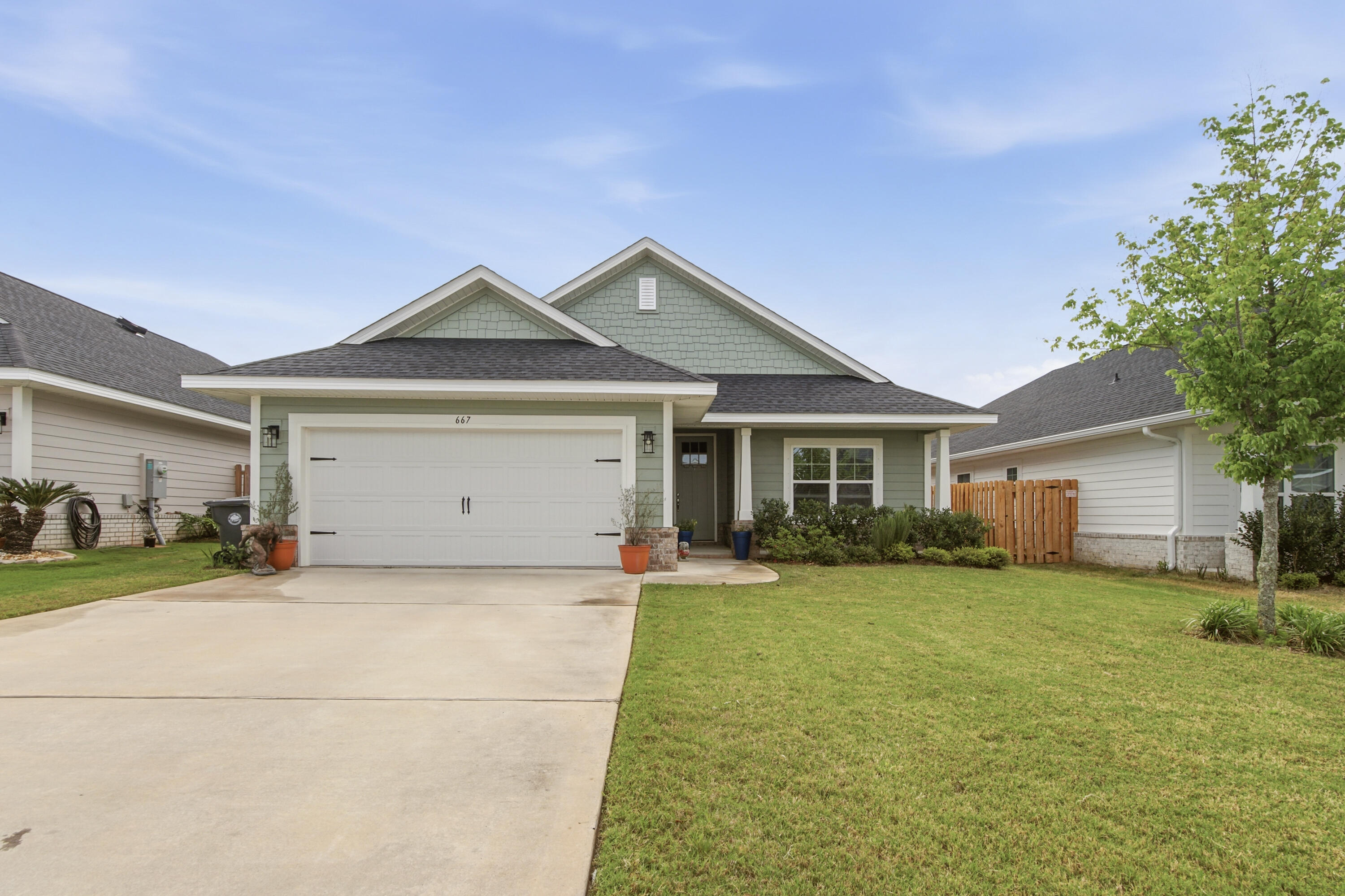 $5,000 Credit at Closing to Buyer for Rate Buy-Down, Closing Costs, or Prepaids! Welcome to The Bluffs at Lafayette -- one of Freeport's fastest-growing and most desirable communities where modern comfort, thoughtful upgrades, and everyday convenience come together beautifully. This is a rare opportunity to own a nearly new home with valuable upgrades already completed for you, including added gas lines supporting a gas fireplace, tankless water heater, and gas stove -- enhancing both efficiency and long-term comfort. This well-designed 3-bedroom, 2-bath home features an open-concept layout with durable luxury vinyl plank flooring throughout, ideal for both everyday living and entertaining. The spacious living area is highlighted by soaring ceilings that create an open and inviting atmosphere filled with natural light. The kitchen offers both style and functionality with quartz countertops, undermount sinks, ample cabinetry, and an open flow into the main living and dining areas. The primary suite serves as a relaxing retreat with tray ceilings, generous space, a large walk-in closet, and a beautifully appointed ensuite bath featuring a separate garden tub and shower, quartz countertops, and dual undermount sinks. Additional interior features include 9'+ ceiling heights, upgraded 8-foot entry doors, and lever-handled hardware throughout, adding both elegance and convenience. Step outside to enjoy the oversized covered rear patio and fully sodded backyard complete with an an irrigation system powered by a private well and pump. Backing up to a natural preserve, this property offers exceptional privacy with no rear neighbors and peaceful wooded views instead of rooftops.

The Bluffs at Lafayette continues to add exciting new amenities, including a brand-new community pool and clubhouse expected to open soon, making this already desirable neighborhood even more attractive for homeowners.

Don't miss your chance to own a move-in ready, nearly new home with upgrades already in place in one of Freeport's most promising communities.