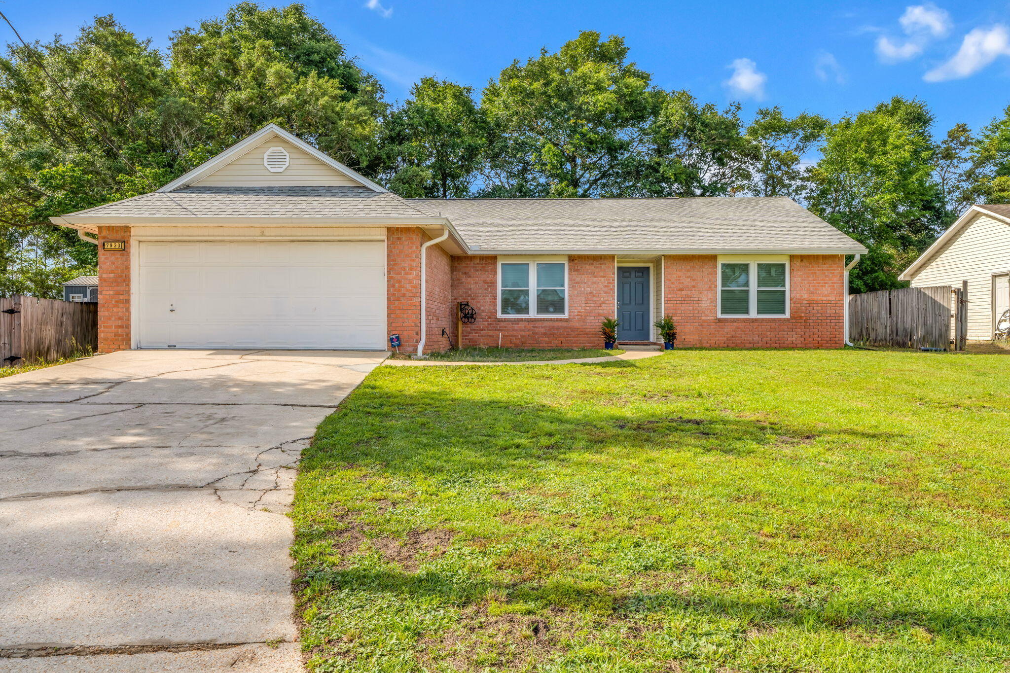 This well-maintained 3-bedroom, 2-bath brick home presents a strong opportunity for investors or owner-occupants alike in the heart of Navarre. Spanning over 1,600 square feet, it combines solid construction with strategic updates that support durability, energy efficiency, and long-term value. Notable improvements include a 2022 roof, HVAC replaced in 2018, hurricane-rated impact glass windows and rear door to reduce insurance risk, and R30 batt insulation in the attic and garage to enhance overall efficiency. The garage also features a 2024 mini-split system, creating a versatile, temperature-controlled space ideal for storage, projects, or workouts. Additional highlights include a fully fenced backyard and convenient proximity to Hurlburt Field. By appointment only but easy to show.