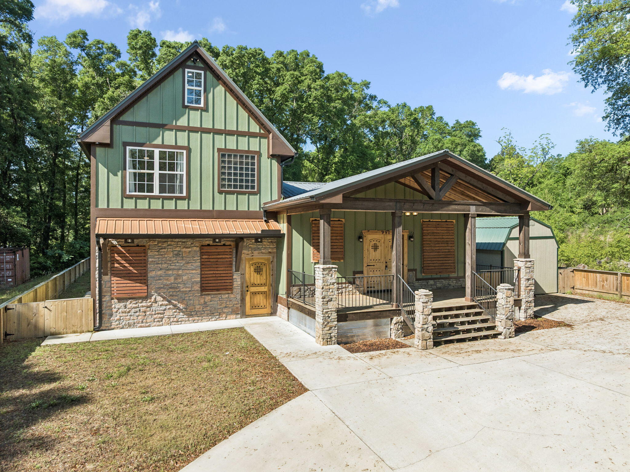 Built in 2022, this beautifully crafted home is TURNKEY ready offers five bedrooms, three full bathrooms, and the freedom of no HOA restrictions. A welcoming covered front porch with stone columns, exposed wood beams, and custom double entry doors creates a striking first impression. Inside, the open-concept layout features a bright and functional kitchen and dining area complete with granite countertops, a large center island, and stainless steel appliances--ideal for both everyday living and entertaining.
The spacious primary suite is conveniently located on the main level and features a stylish barn door leading into the luxurious ensuite bath with dual vanities, a raised soaking tub, a tiled shower, and two walk-in closets. Just beyond, the sunken living room offers a warm yet expansive space for gathering, with thoughtful design details and comfortable flow throughout the home. The third floor highlights a perfect bonus room for families.
