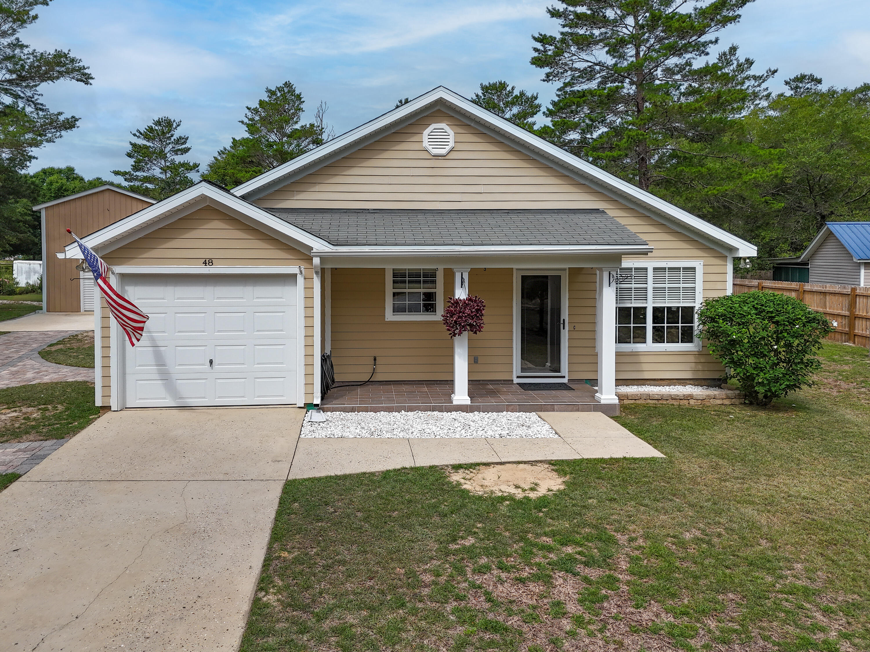 Beautifully maintained and move-in ready, this one-owner home sits on a spacious .34-acre lot with NO HOA fees or restrictions and features an impressive 18x22 insulated pole barn/workshop with power, loft storage, and an 8-foot roll-up door. Offering the freedom and flexibility you've been looking for, this property has been thoughtfully improved over the years and includes durable Hardie siding, privacy fencing along the side yards, and extensive drainage enhancements for added peace of mind. Inside, you'll find fresh interior paint and a new HVAC system with a Nest thermostat for modern comfort and efficiency. All appliances convey, including the washer and dryer, providing added convenience for the next owner.

Step outside and enjoy the expanded outdoor living space complete with a fire pit area and additional paver patio space perfect for a future pergola, entertaining, or relaxing evenings at home. The extended paver driveway and walkways add both curb appeal and convenience while creating seamless access throughout the property.

The detached workshop is ideal for hobbies, storage, equipment, recreational vehicles, or a home-based business setup. An additional 20x20 concrete pad provides even more versatility and usable outdoor space. Custom-fit storm panels are available for all windows, offering added storm protection and peace of mind. This property truly has it all-space, functionality, thoughtful upgrades, and exceptional pride of ownership both inside and out. Don't miss your opportunity to own this unique property with room to live, work, and play without HOA restrictions!

Conveniently located in DeFuniak Springs, this property offers easy access to everything you need while still providing space and privacy. Downtown DeFuniak Springs, Baldwin Avenue shopping, dining, and Main Street attractions are all less than 5 minutes away. Crestview is less than 25 miles away, while the world-renowned beaches of 30A are just over 30 miles from your doorstep. Outdoor enthusiasts will appreciate being only 3 miles from Lake Stanley Park, with additional parks, recreational opportunities, shopping, dining, and everyday conveniences all nearby.