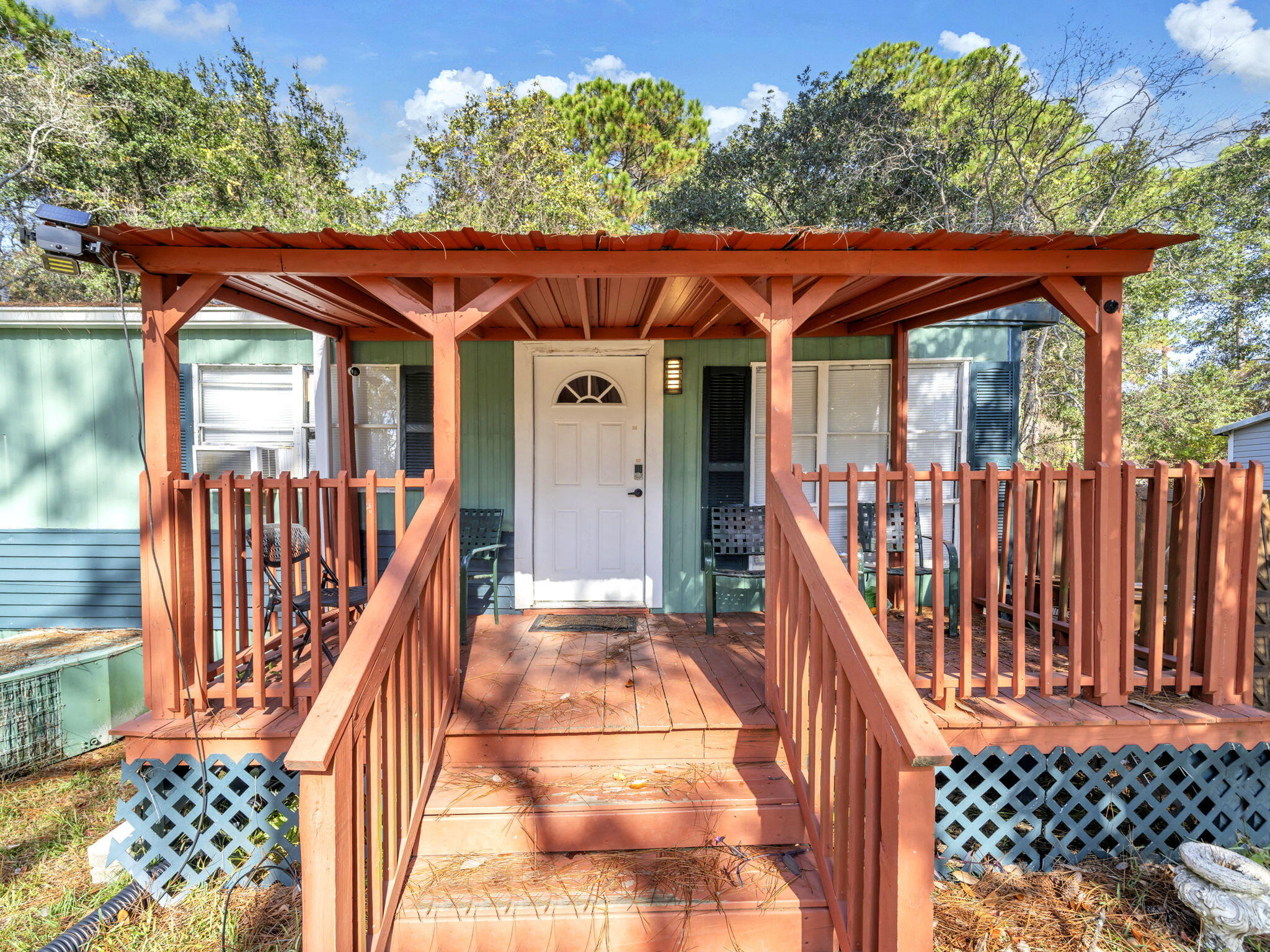 Affordable Navarre opportunity featuring updates, spacious outdoor living, and strong prior rental history.  This 3-befroom, 2-bath home features updated baths, newer vinyl flooring, fresh paint, tankless water heater, upgraded rear deck, and spacious yard or relaxing or entertaining.  Conveniently located near Hwy 98, shopping, dining, and area beaches.  Ideal as rental, second home, or primary residence.  Cash buyers only.