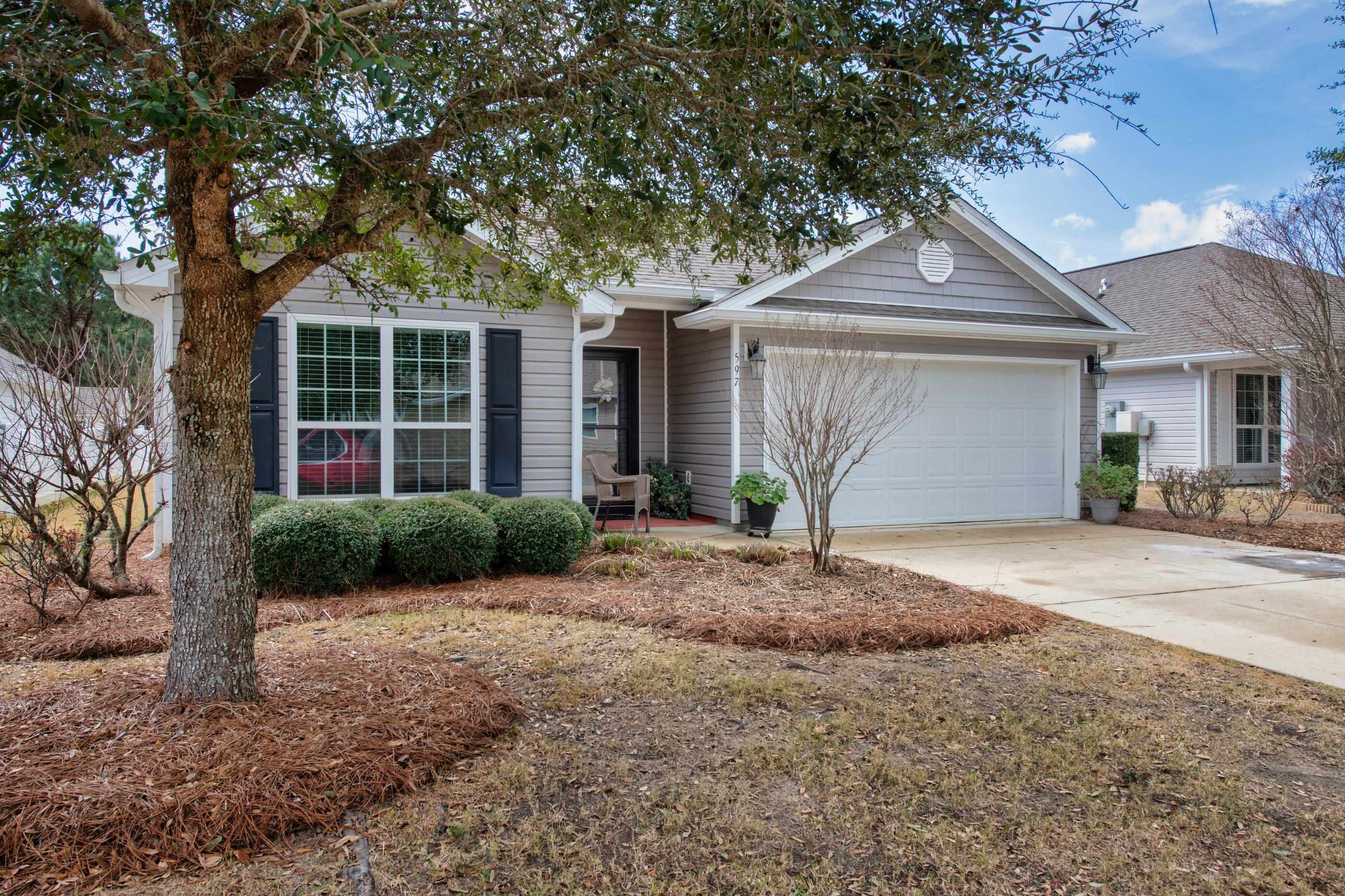 Hammock Bay offers more than convenience, it's where top-tier access to amenities and everyday essentials meets a welcoming atmosphere that turns neighbors into community. Ideally located within the neighborhood, this inviting 4 bdrm,  2 ba home features  engineered flooring throughout the main living areas, with carpeted bedrooms for added comfort. A thoughtfully designed floor plan places the guest bdrms and bath on one side of the home, while the primary bdrm and bath w dbl vanity and separate shower is tucked away on the other for additional privacy, with the kitchen and living room centrally located. Additional features include a two-car garage and a laundry room conveniently connecting the garage and kitchen. Step outside from the living room onto the patio and unwind  in a spacious backyard that backs to a peaceful wooded nature preserve. 

You are minutes to the Town Center and all that Hammock Bay offers. There are  3 clubhouses: an Owner's Club house, Creekside Clubhouse and Bayfront Clubhouse.  Enjoy the 8000 sq ft fitness center,  general store, brewery, gazebo, dog park, amphitheater with a big screen.  There are pickle ball, tennis and basket ball courts a sports complex, newly built middle school and miles of walking trails.  Get on the mailing list and you will receive all the events happening in Hammock Bay.  

Buyer(s) are responsible to personally verify all details for property and dimensions. Any information contained in this listing is believed to be accurate but is not guaranteed.