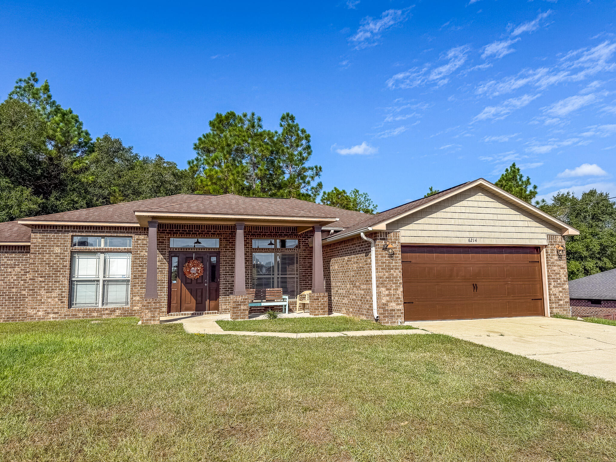 Welcome to 6214 Flash Drive, where comfort, space, and everyday functionality come together in this beautifully refreshed 4-bedroom, 2-bath home located in desirable North Crestview. Offering a peaceful setting with convenient access to town, this home is ideal for buyers seeking room to spread out without sacrificing location.

Step inside to find fresh interior paint and new luxury vinyl plank flooring throughout, all in timeless neutral tones that create a clean, modern backdrop ready for your personal style. The spacious living room is centered around a cozy fireplace, making it the perfect place to unwind at the end of the day or gather with family and friends.